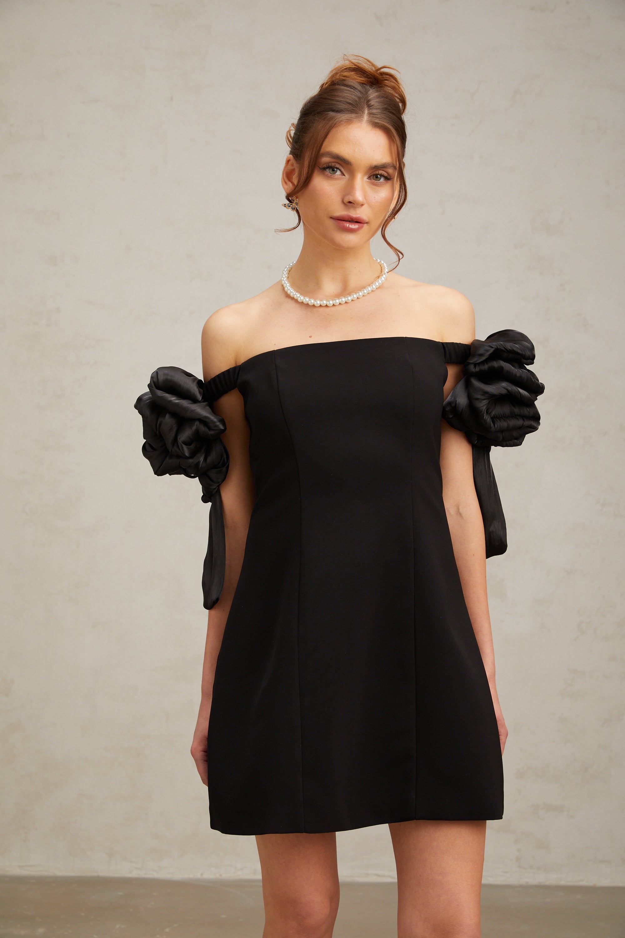 Erica black flower-detail off-shoulder mini dress