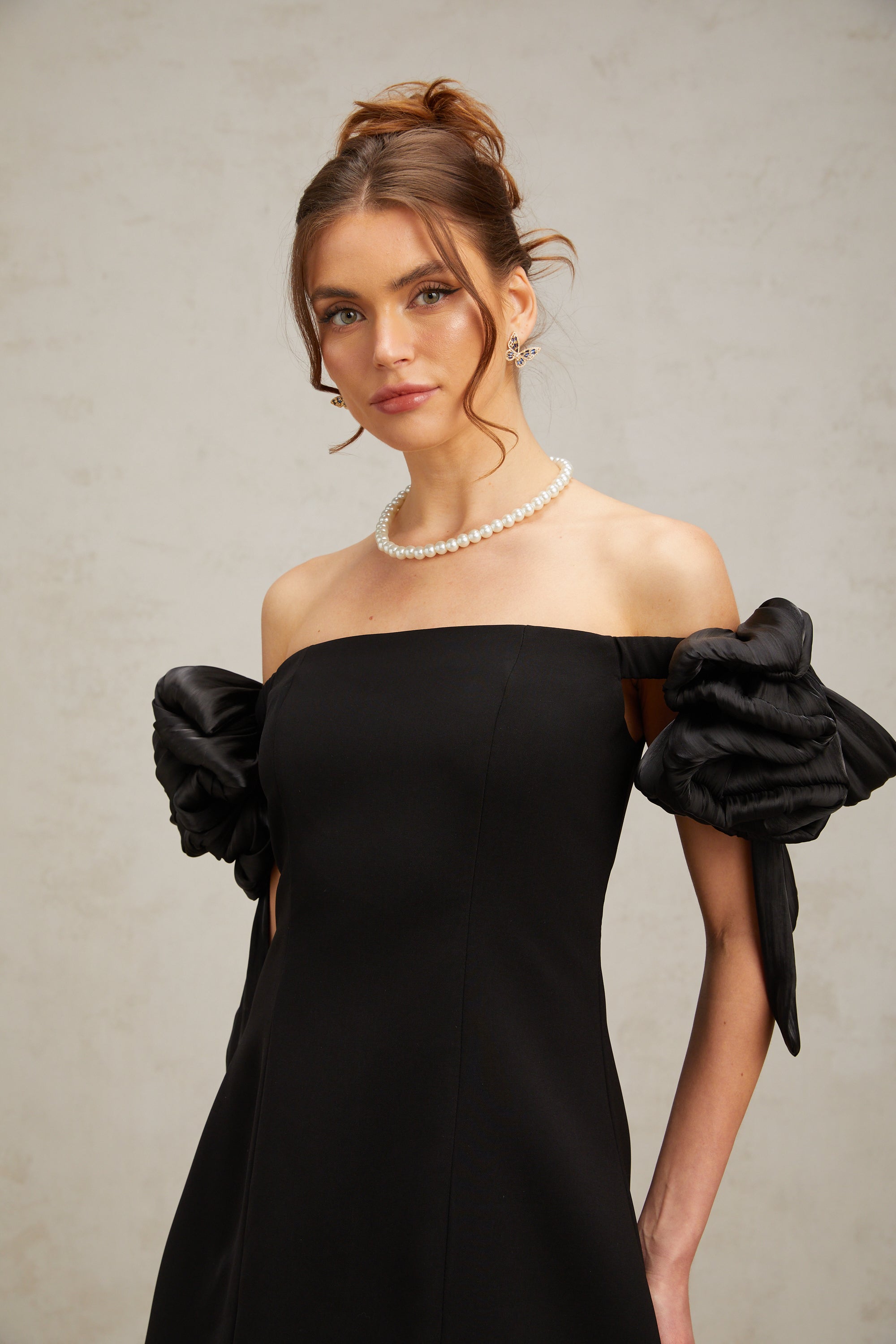 Erica black flower-detail off-shoulder mini dress