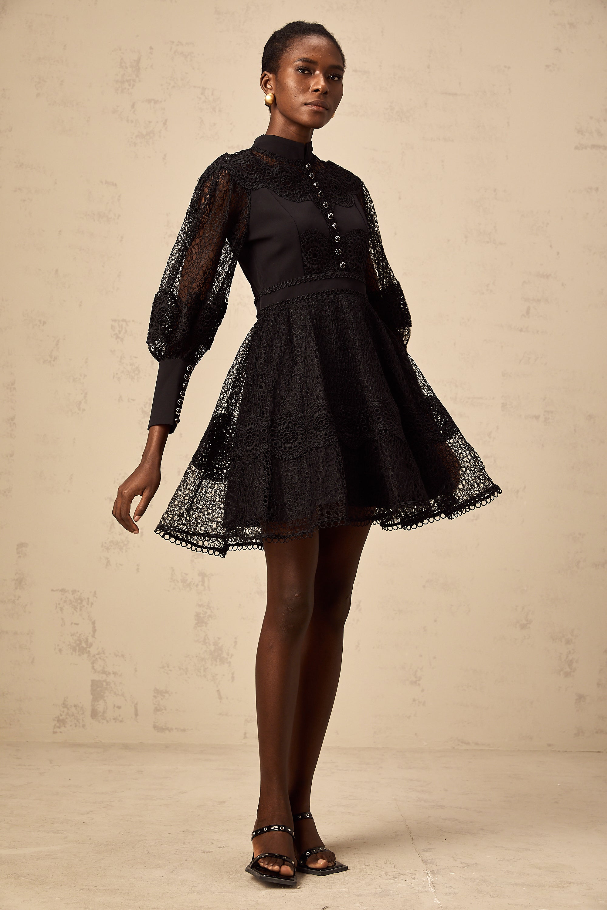 Quella black guipure-lace flared mini dress