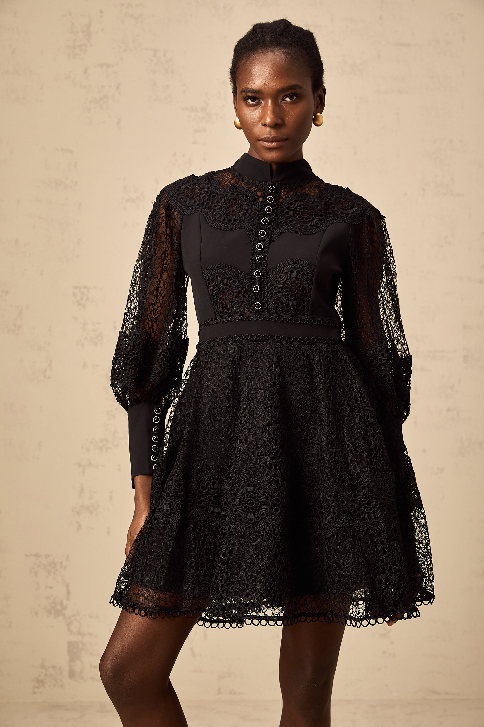 Quella black guipure-lace flared mini dress