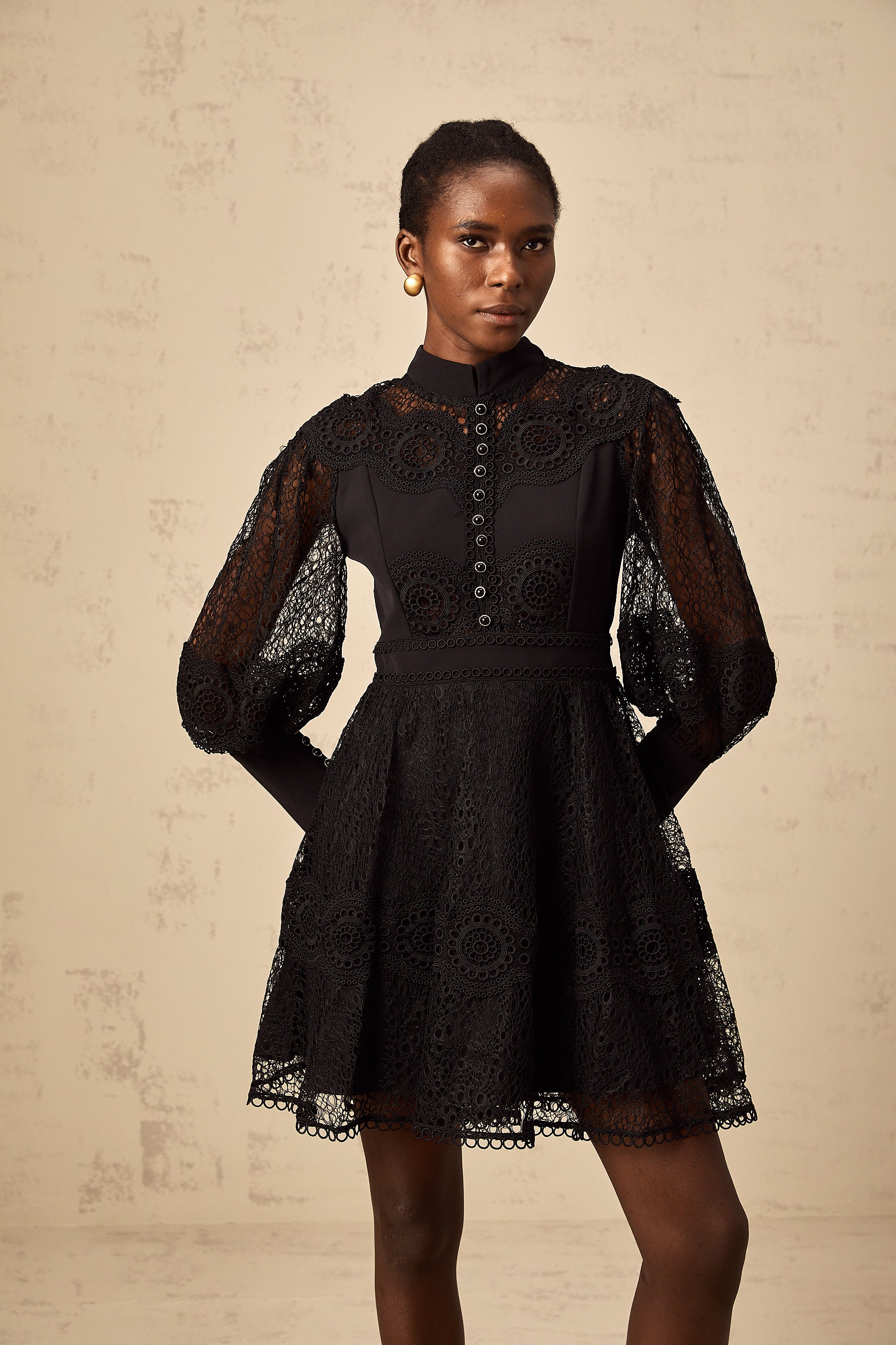 Quella black guipure-lace flared mini dress