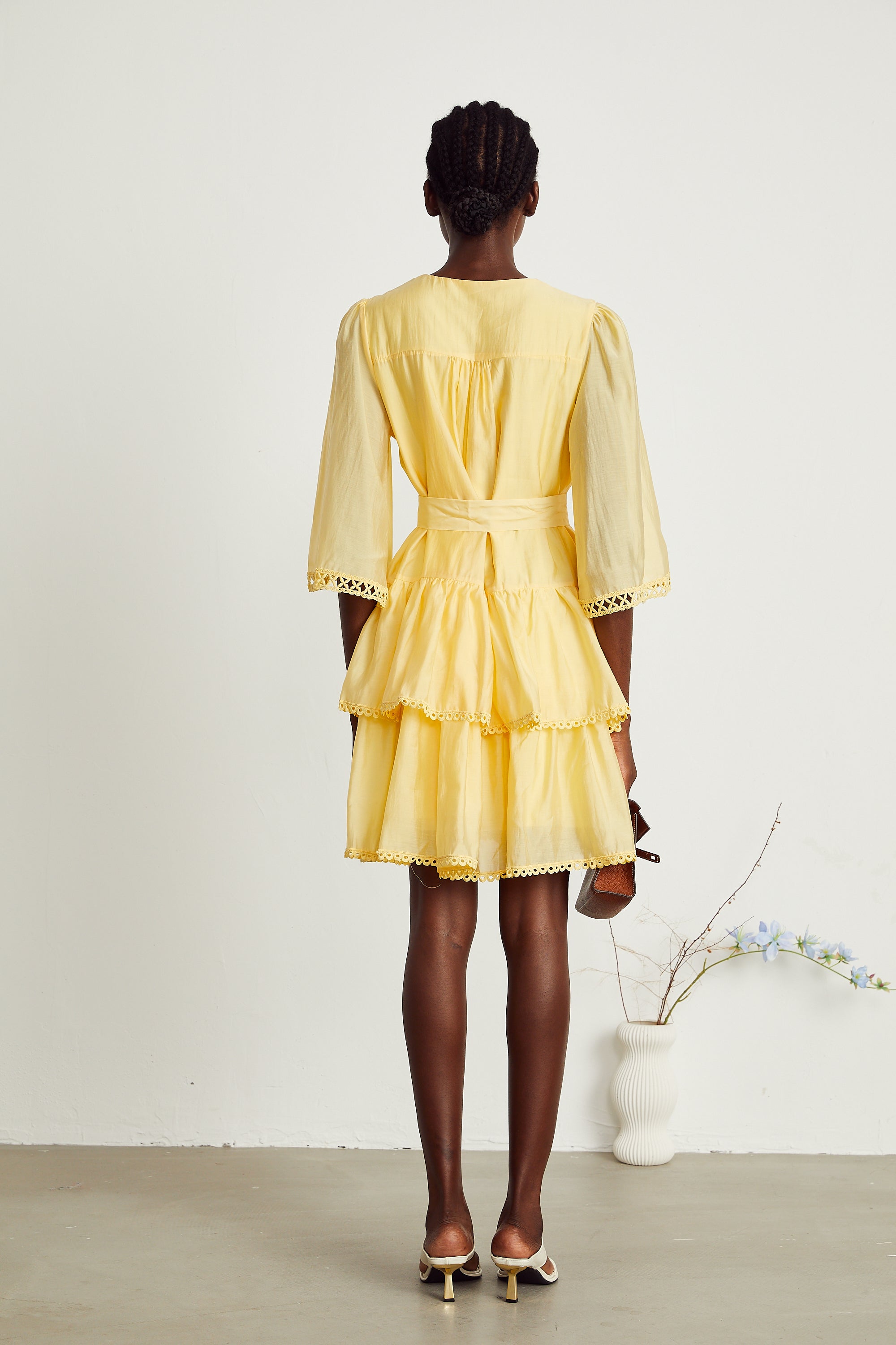 Karine yellow lace-trim tiered mini dress