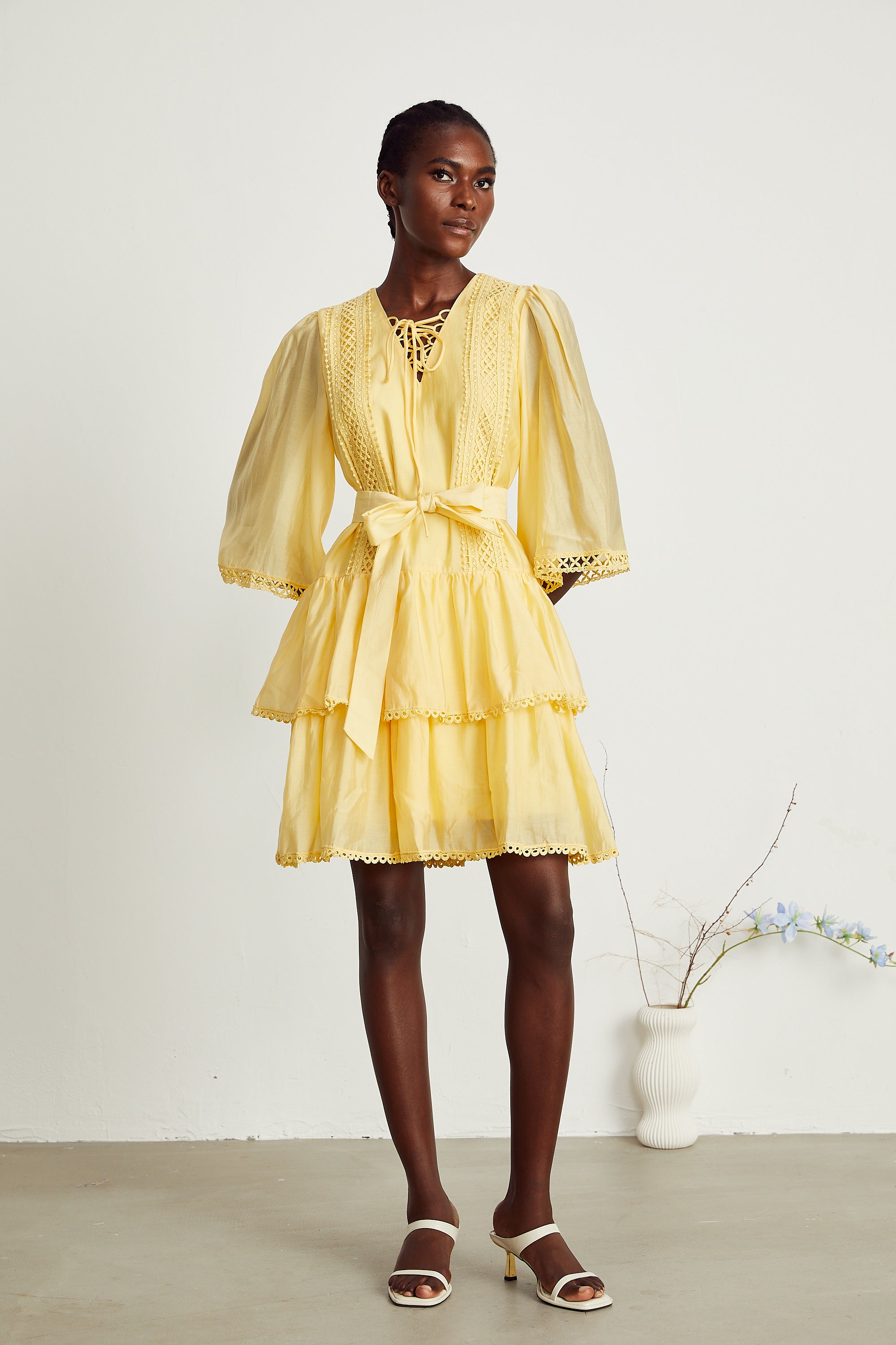 Karine yellow lace-trim tiered mini dress