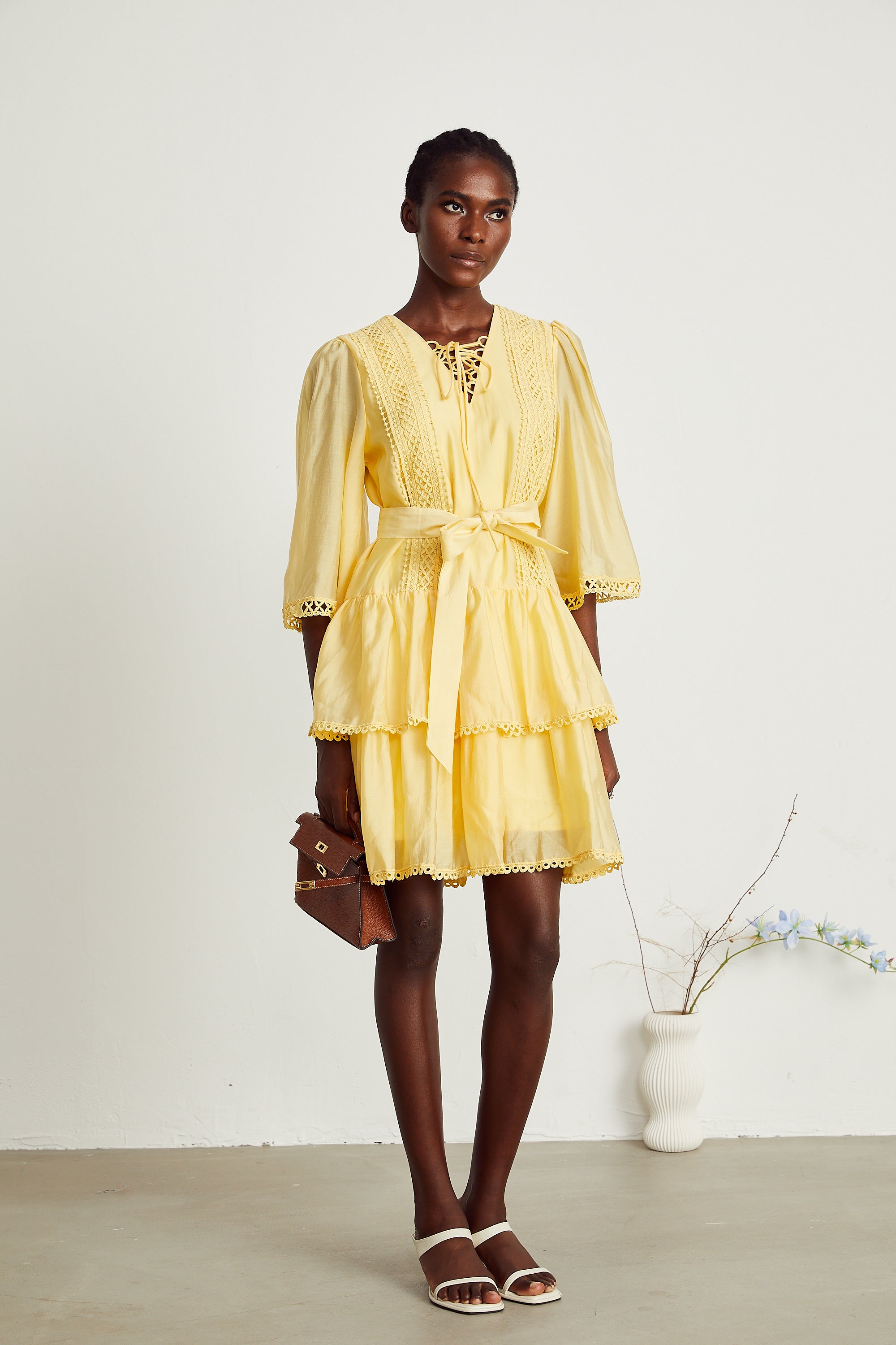 Karine yellow lace-trim tiered mini dress