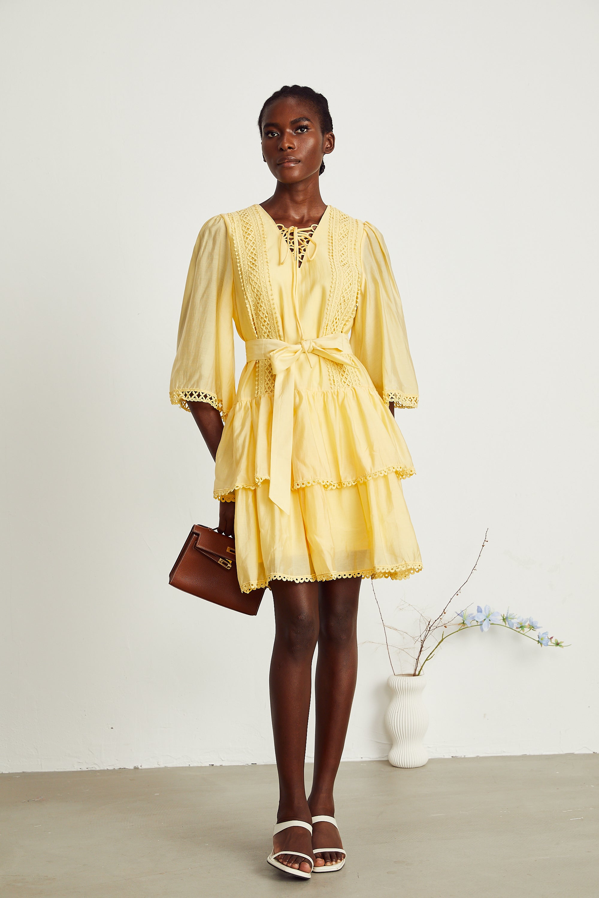 Karine yellow lace-trim tiered mini dress