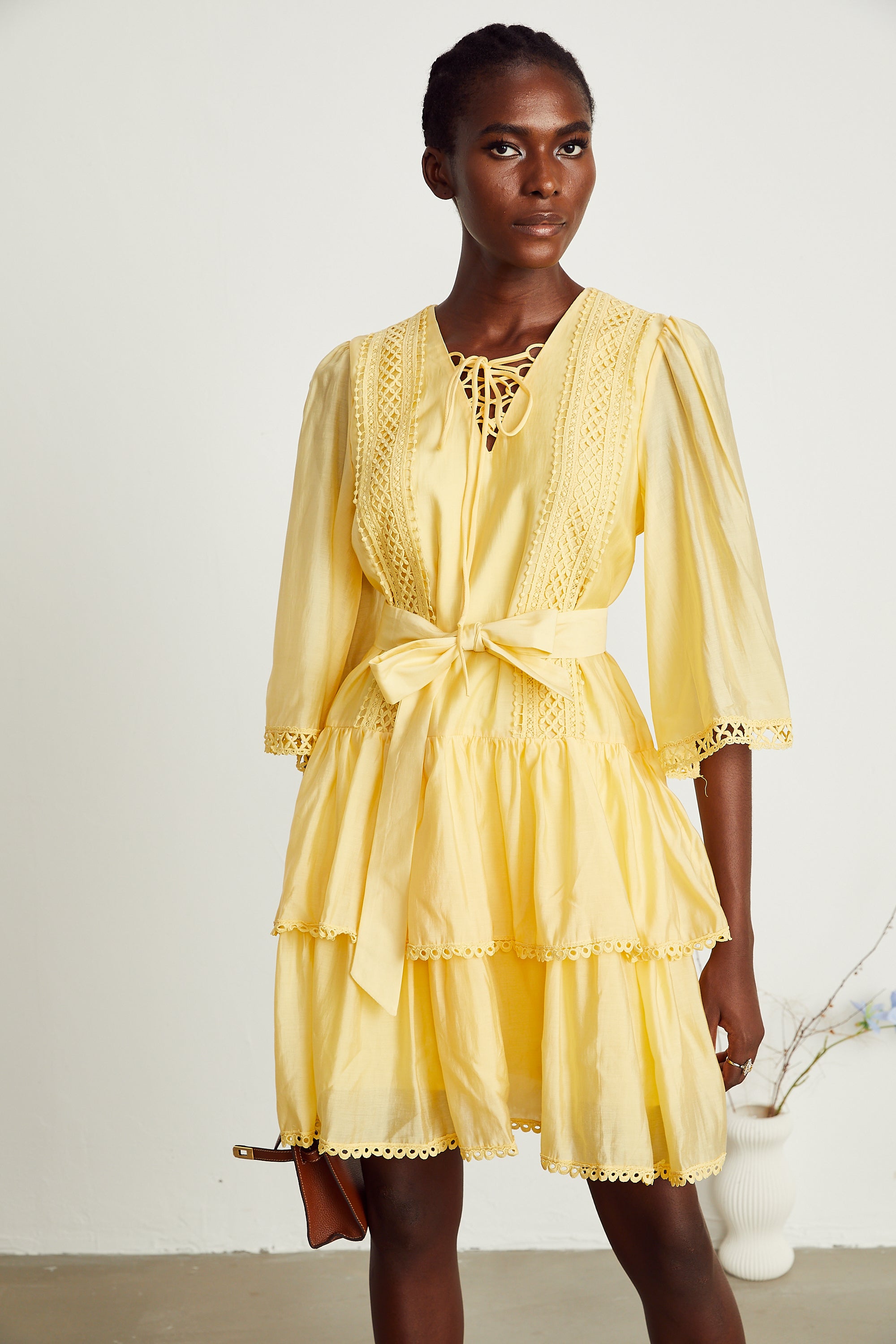 Karine yellow lace-trim tiered mini dress