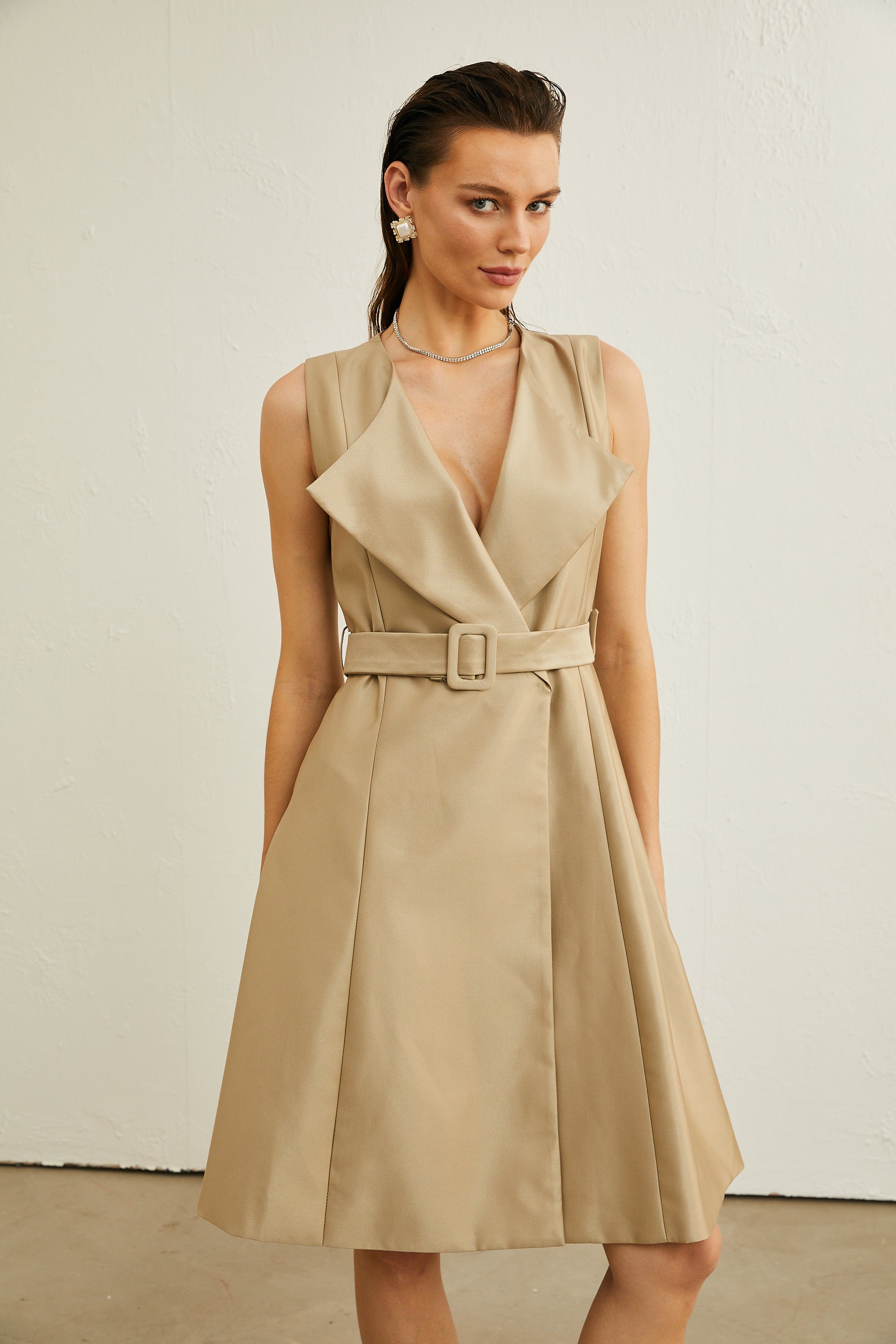 Gisèle sleeveless belted midi dress