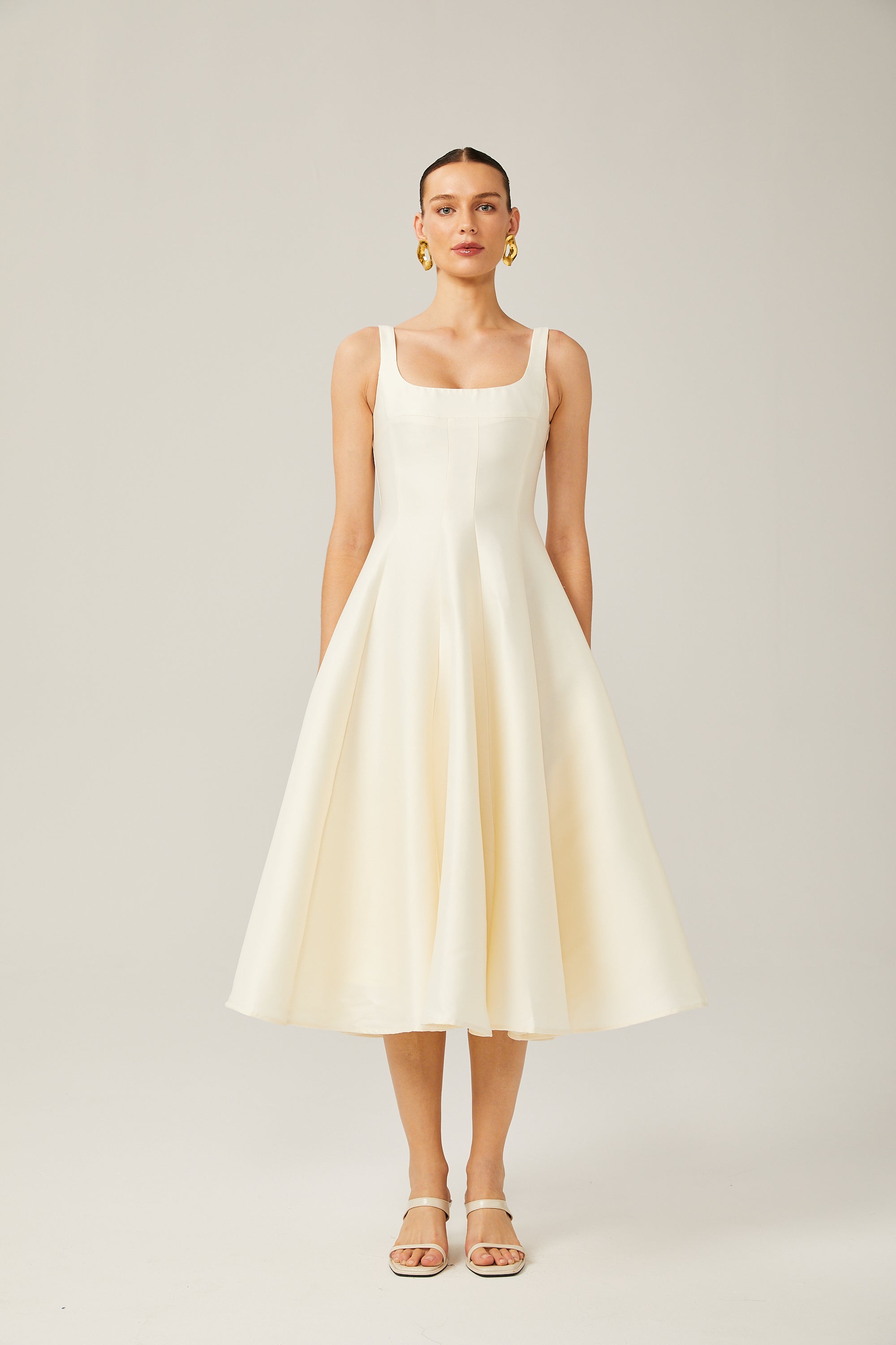 Léonor satin fitted flared midi dress