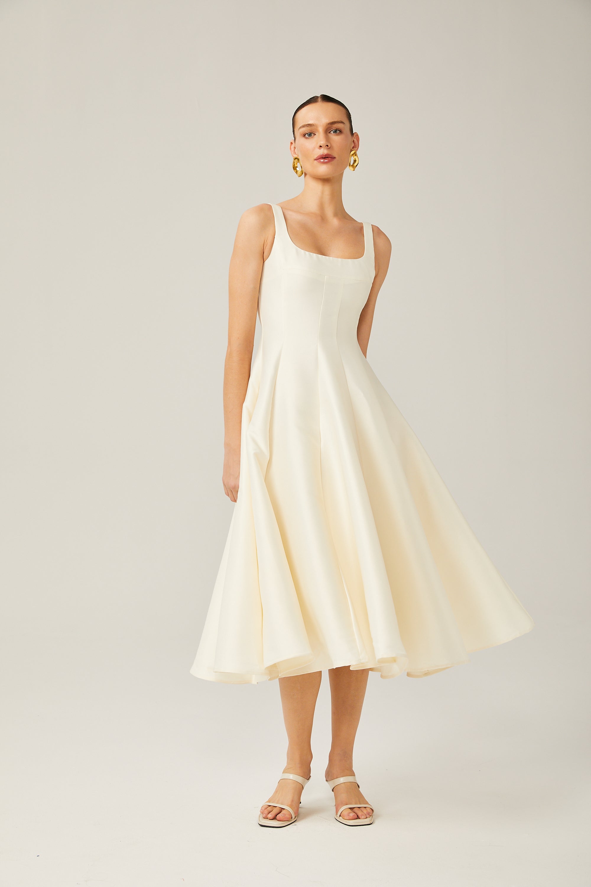 Léonor satin fitted flared midi dress