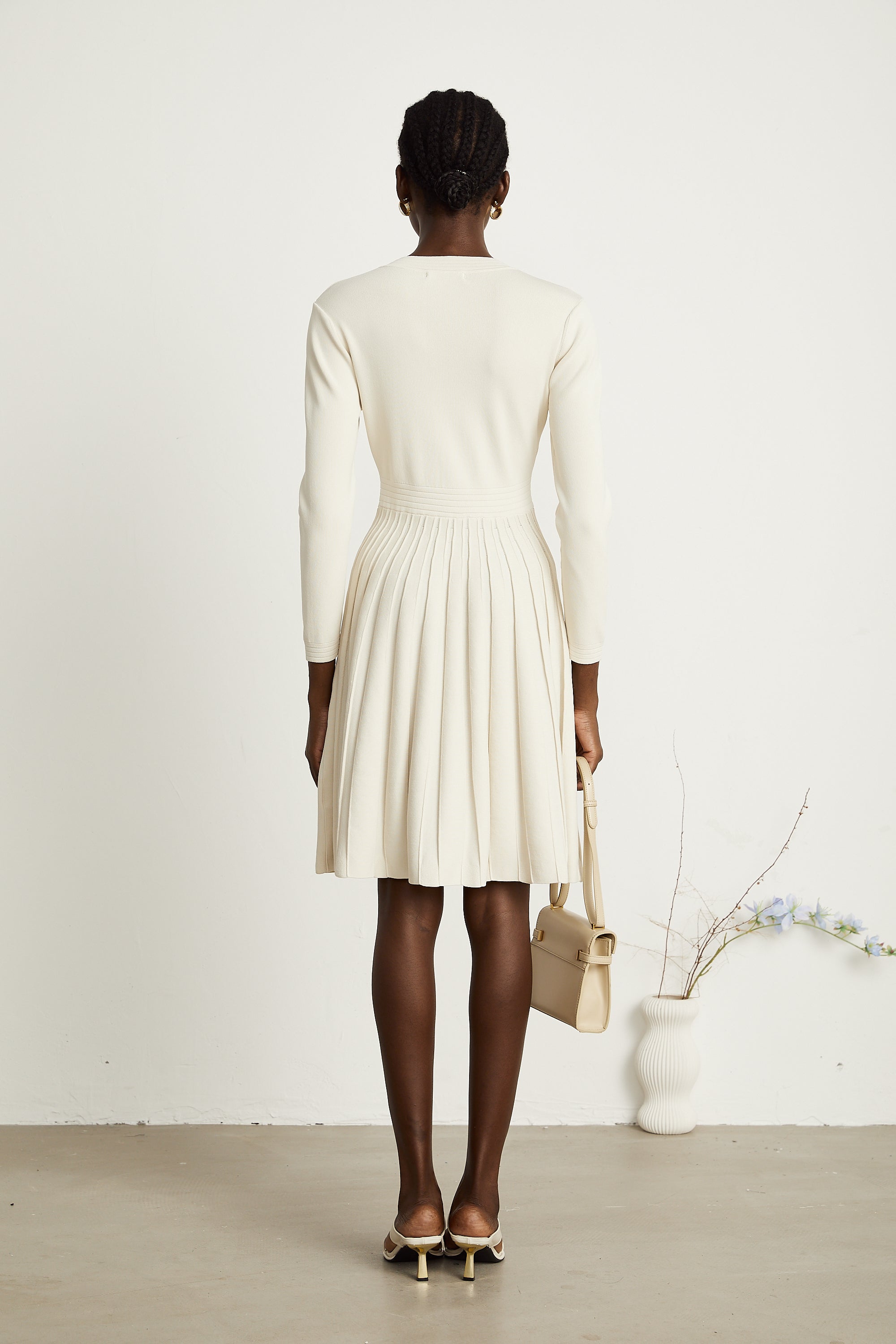 Bérengère white knitted pleated mini dress