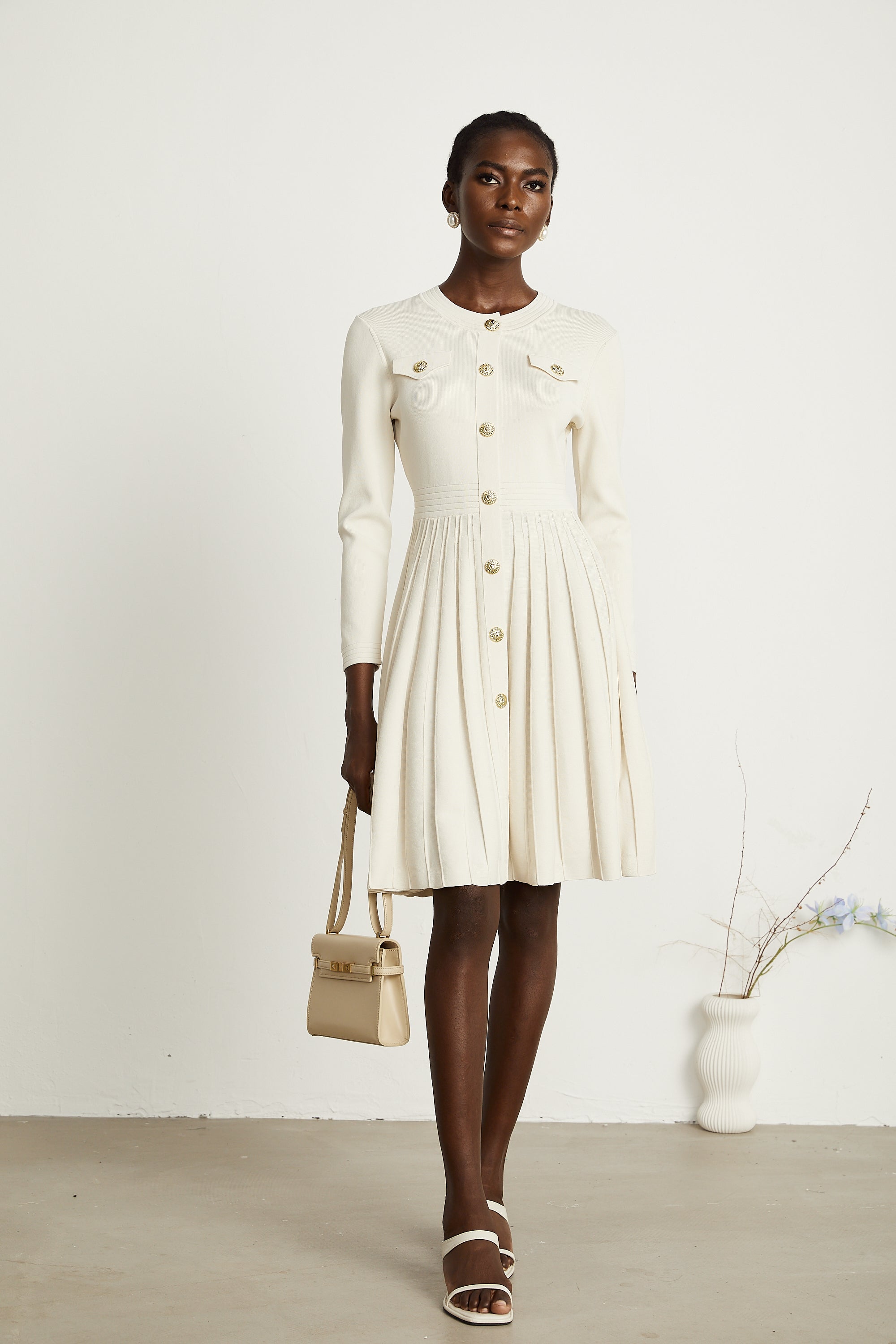 Bérengère white knitted pleated mini dress