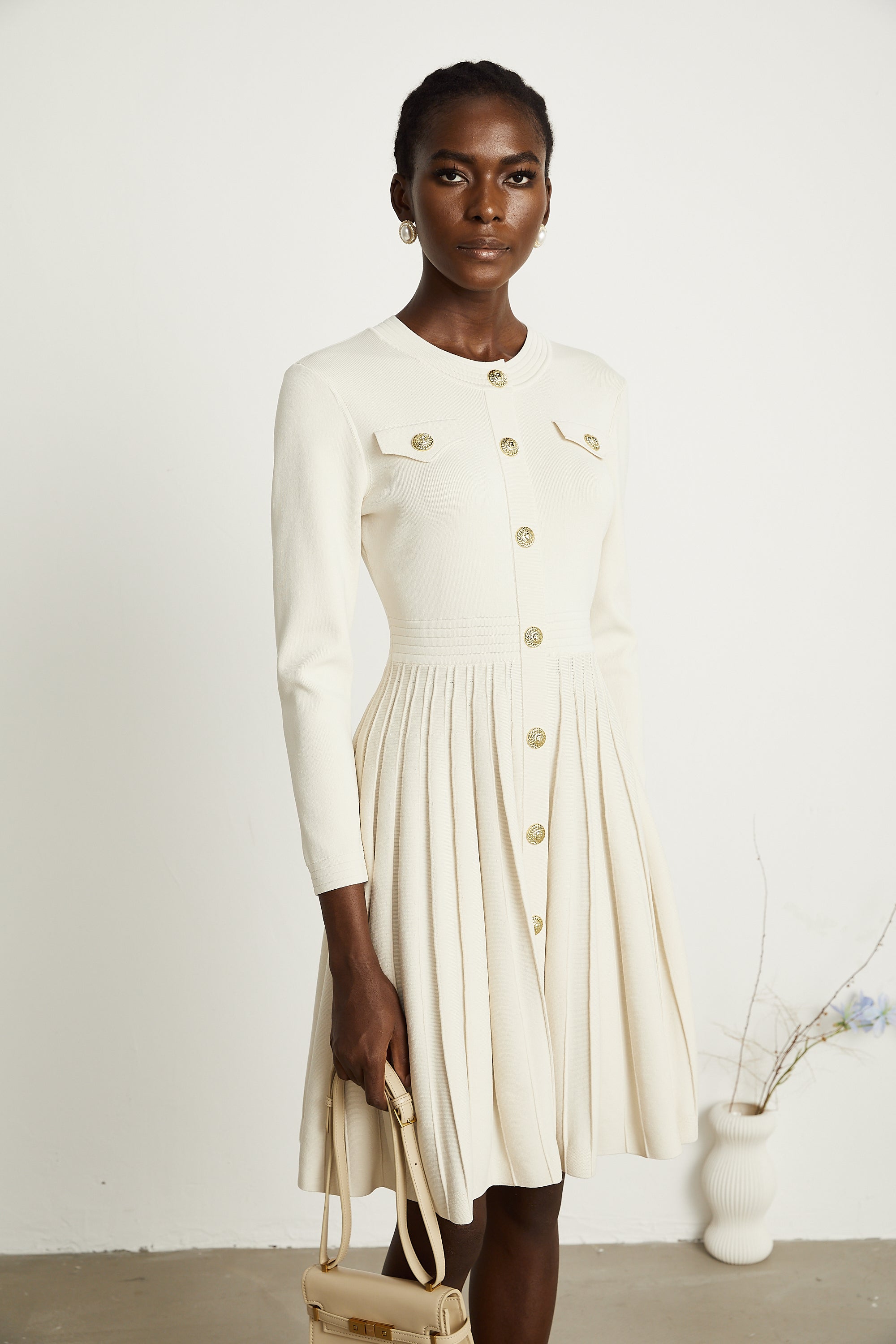 Bérengère white knitted pleated mini dress