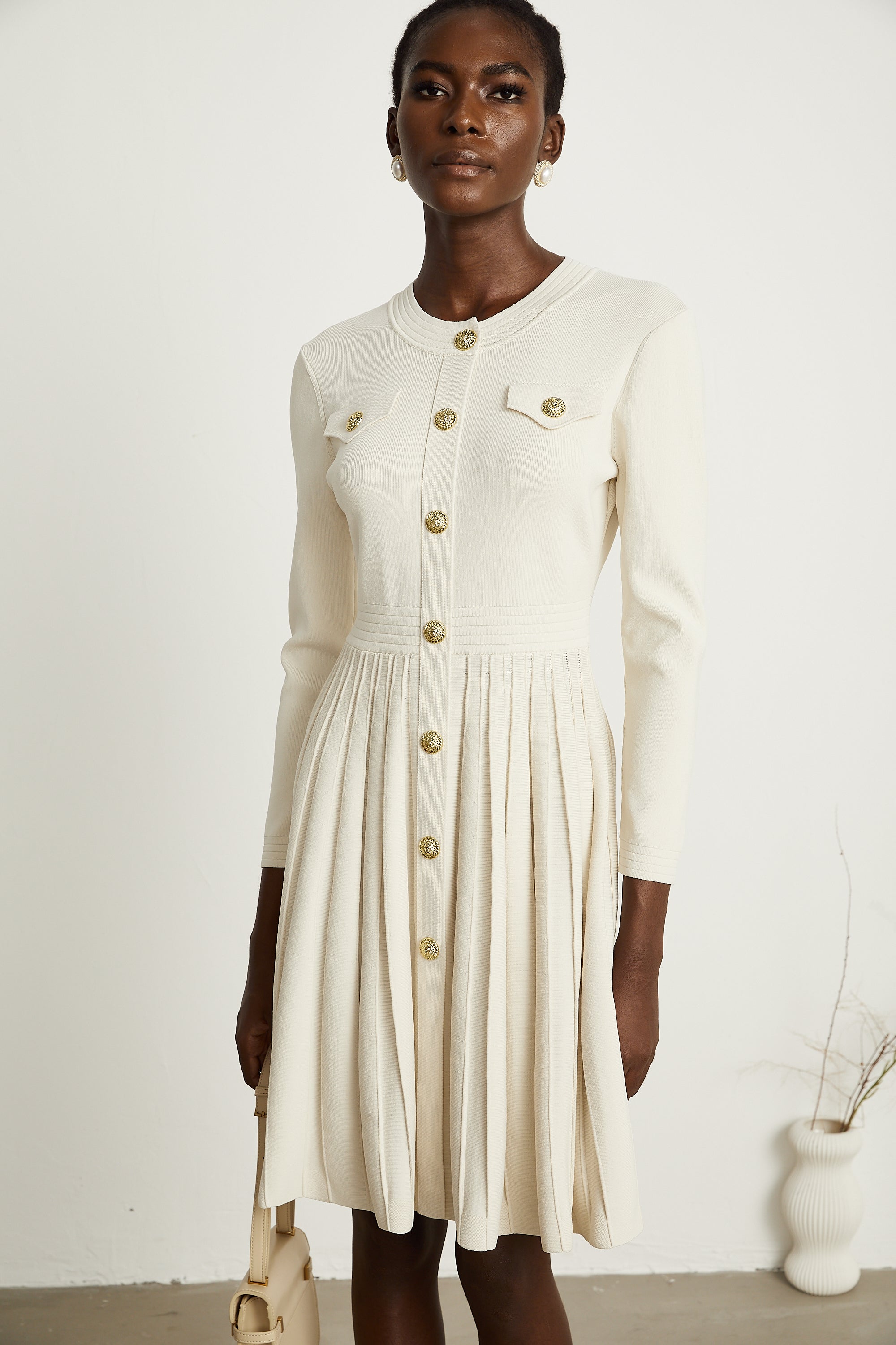 Bérengère white knitted pleated mini dress