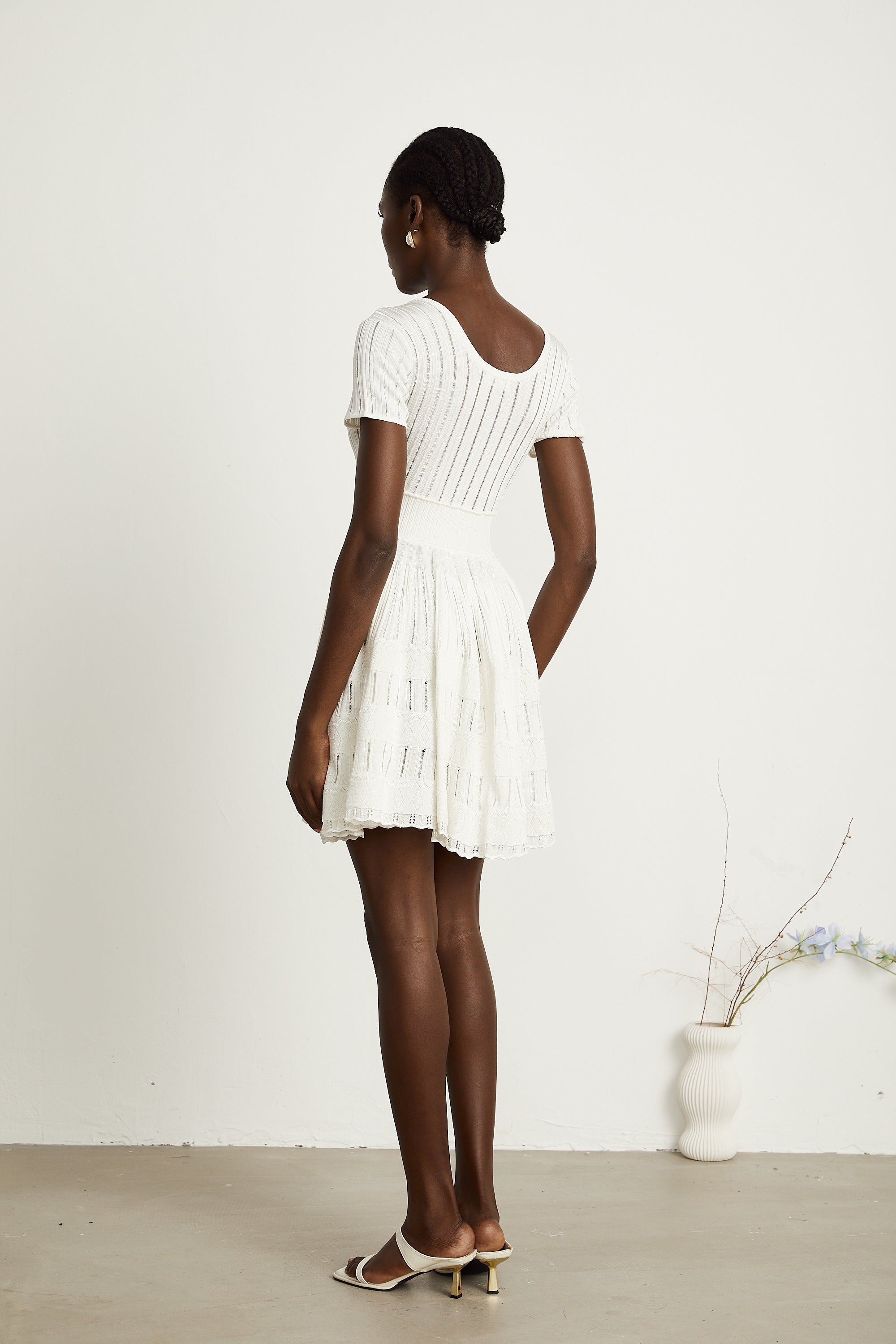 Calixte white knitted pleated mini dress