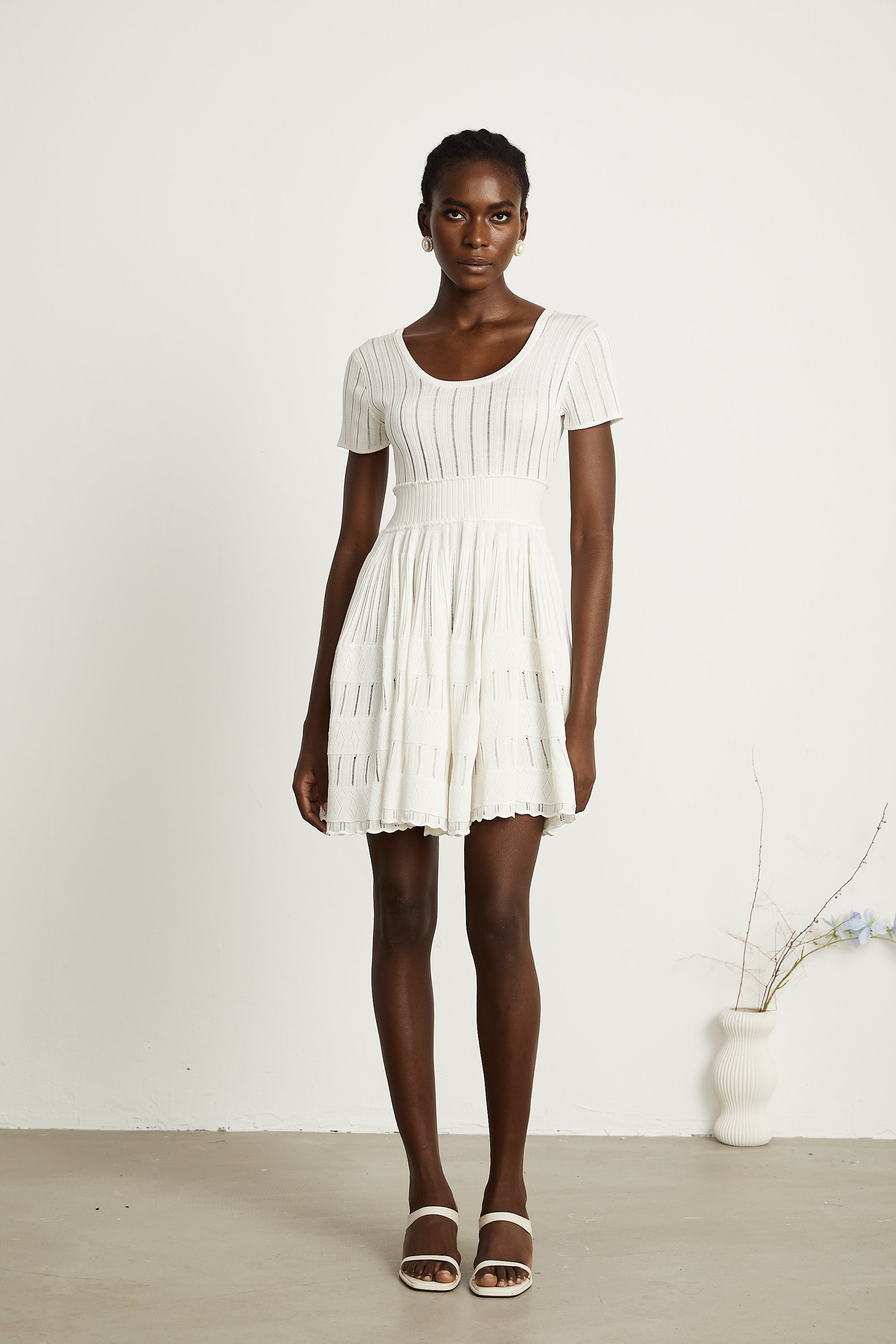 Calixte white knitted pleated mini dress