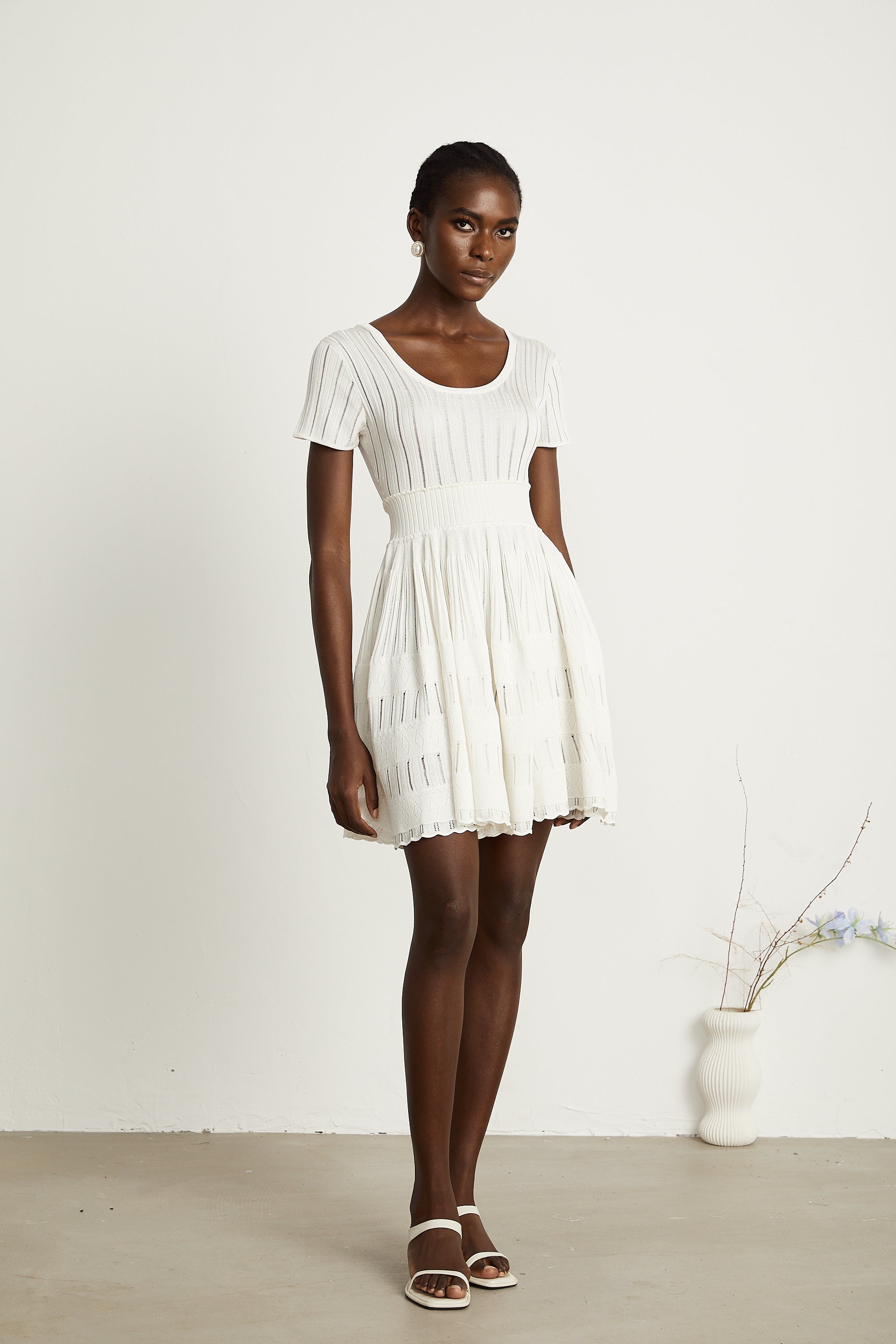 Calixte white knitted pleated mini dress