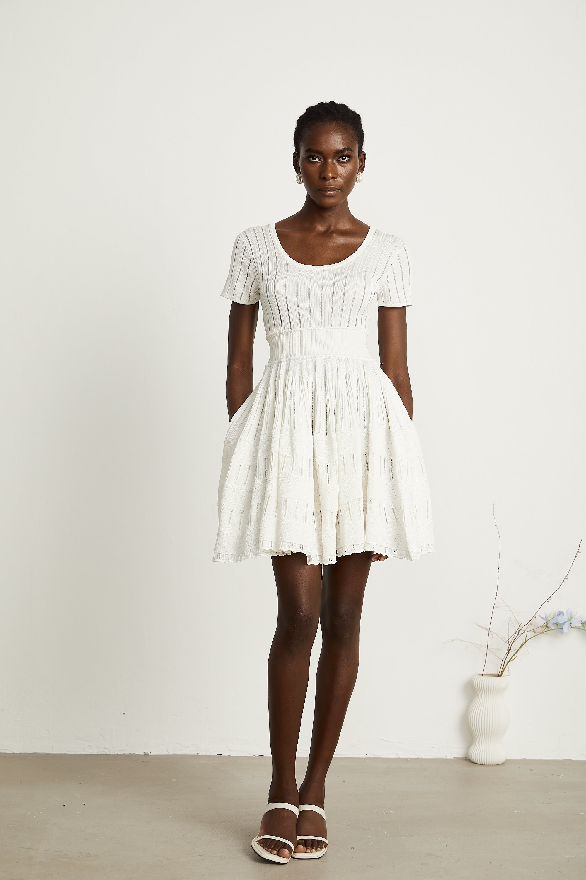 Calixte white knitted pleated mini dress