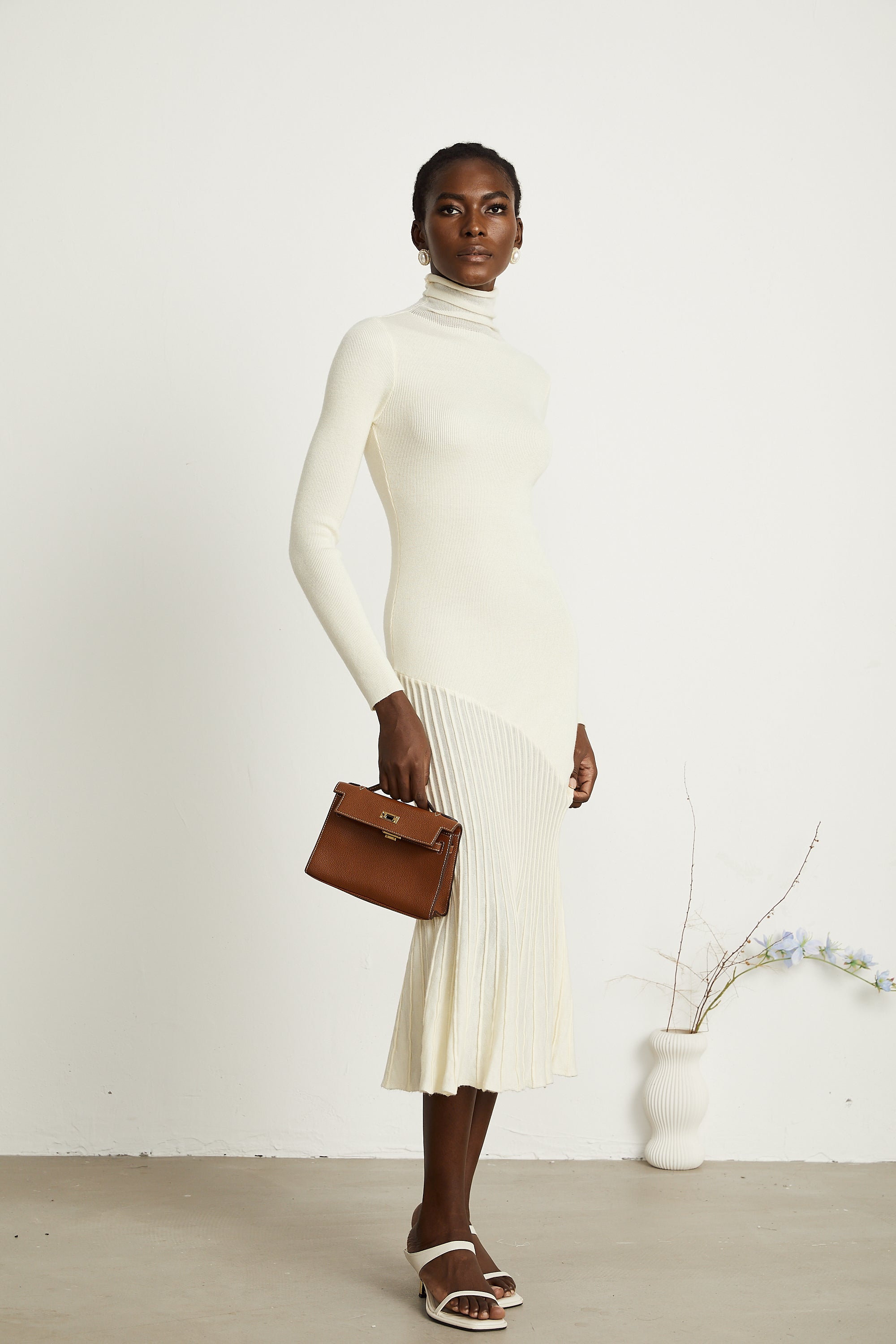 Émeline white knitted pleated midi dress