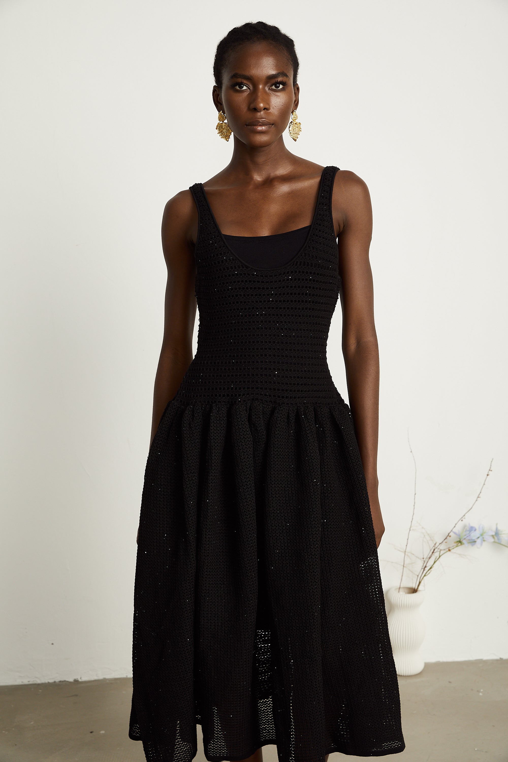 Clotilde black crochet-knit midi dress