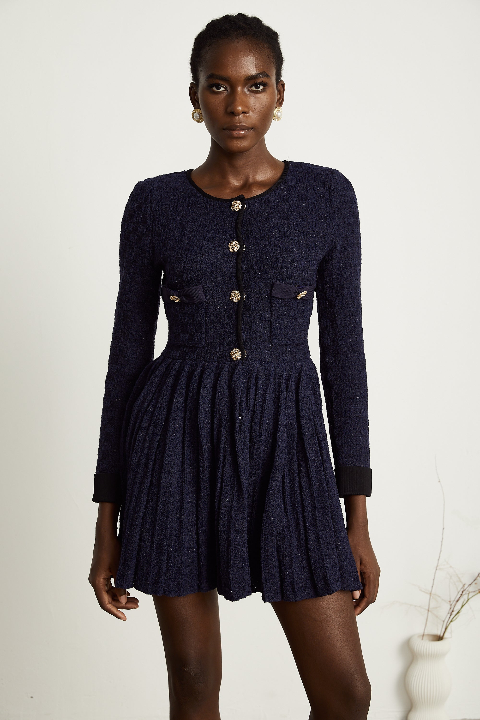 Cloé knitted pleated mini dress