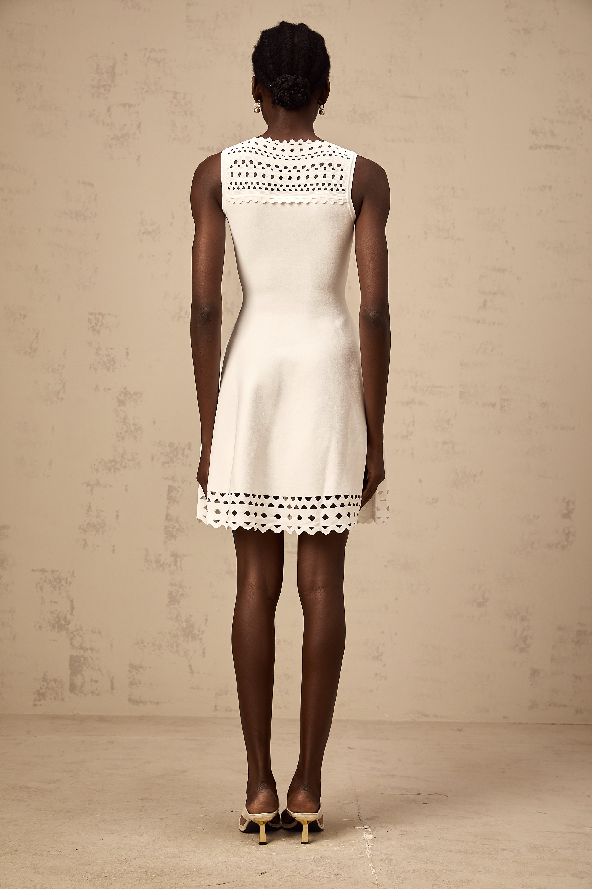 Colette white cut-out sleeveless knitted mini dress