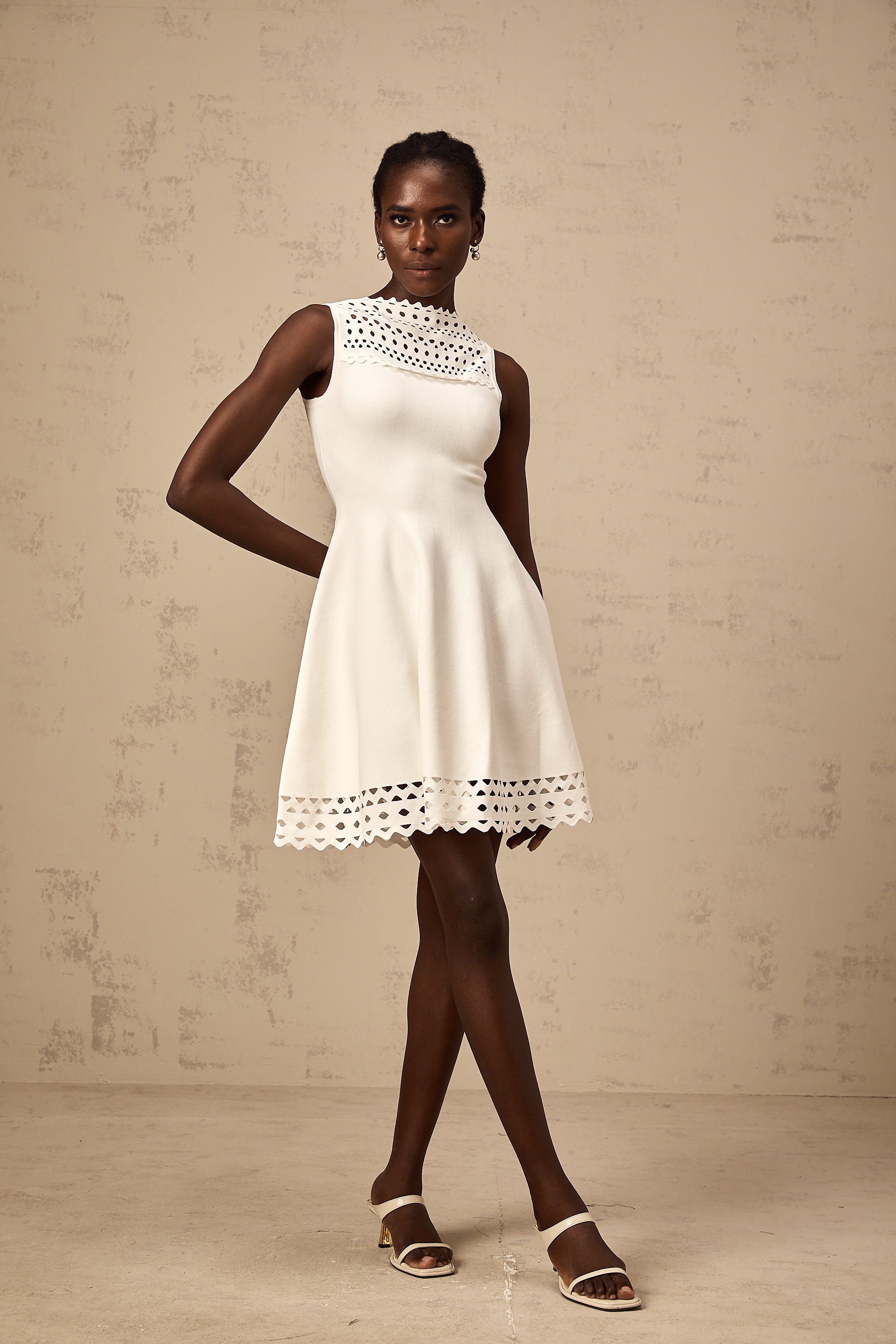 Colette white cut-out sleeveless knitted mini dress