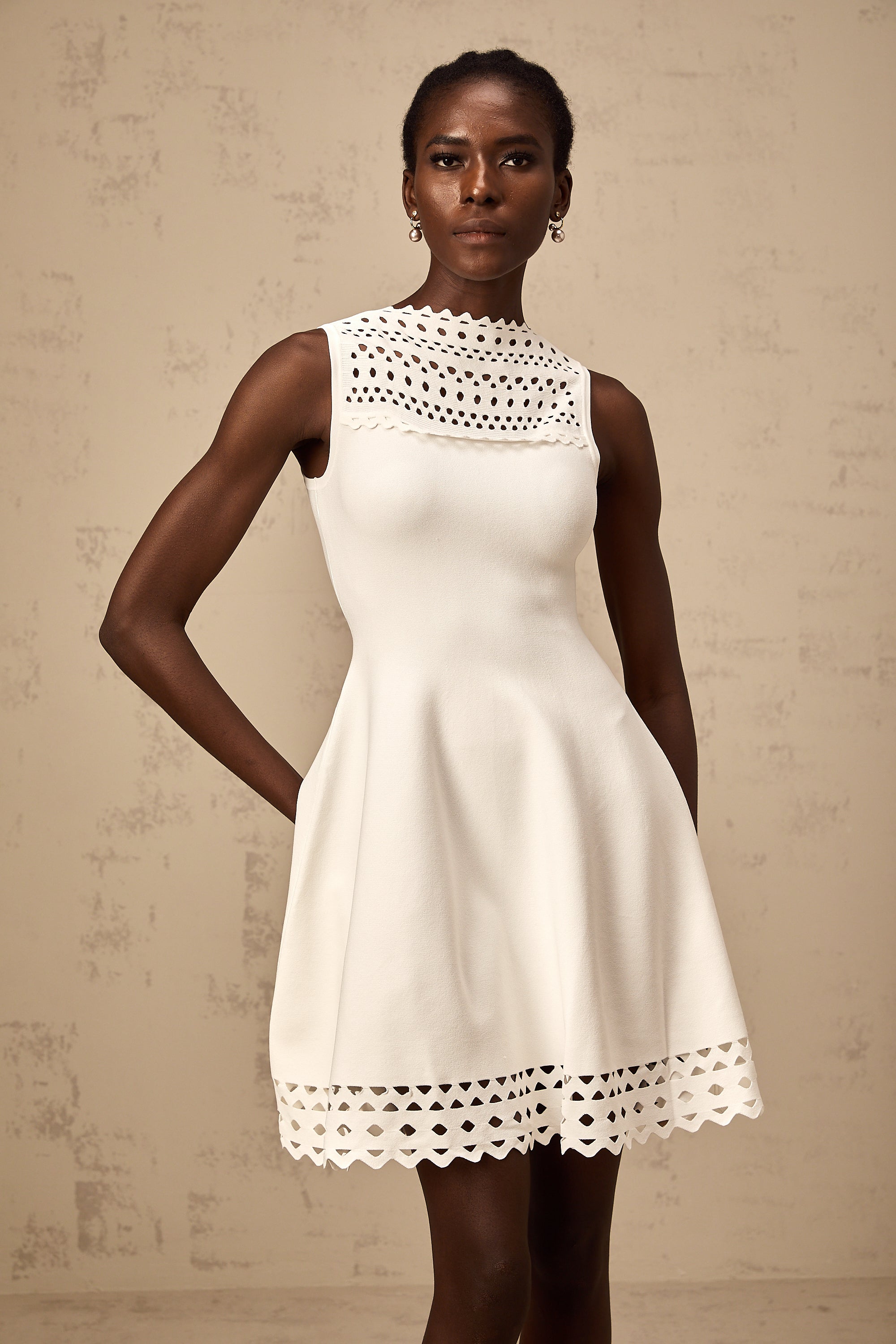 Colette white cut-out sleeveless knitted mini dress