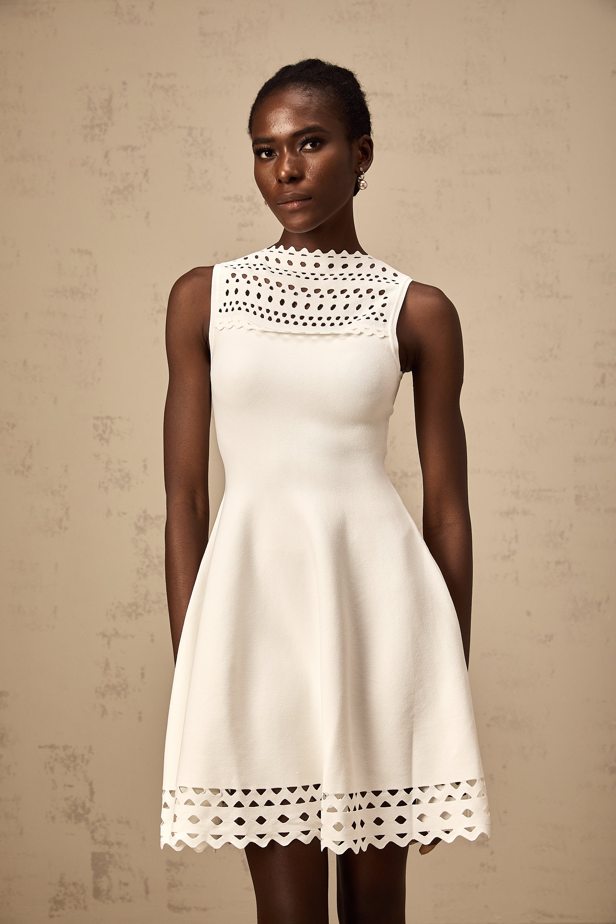 Colette white cut-out sleeveless knitted mini dress