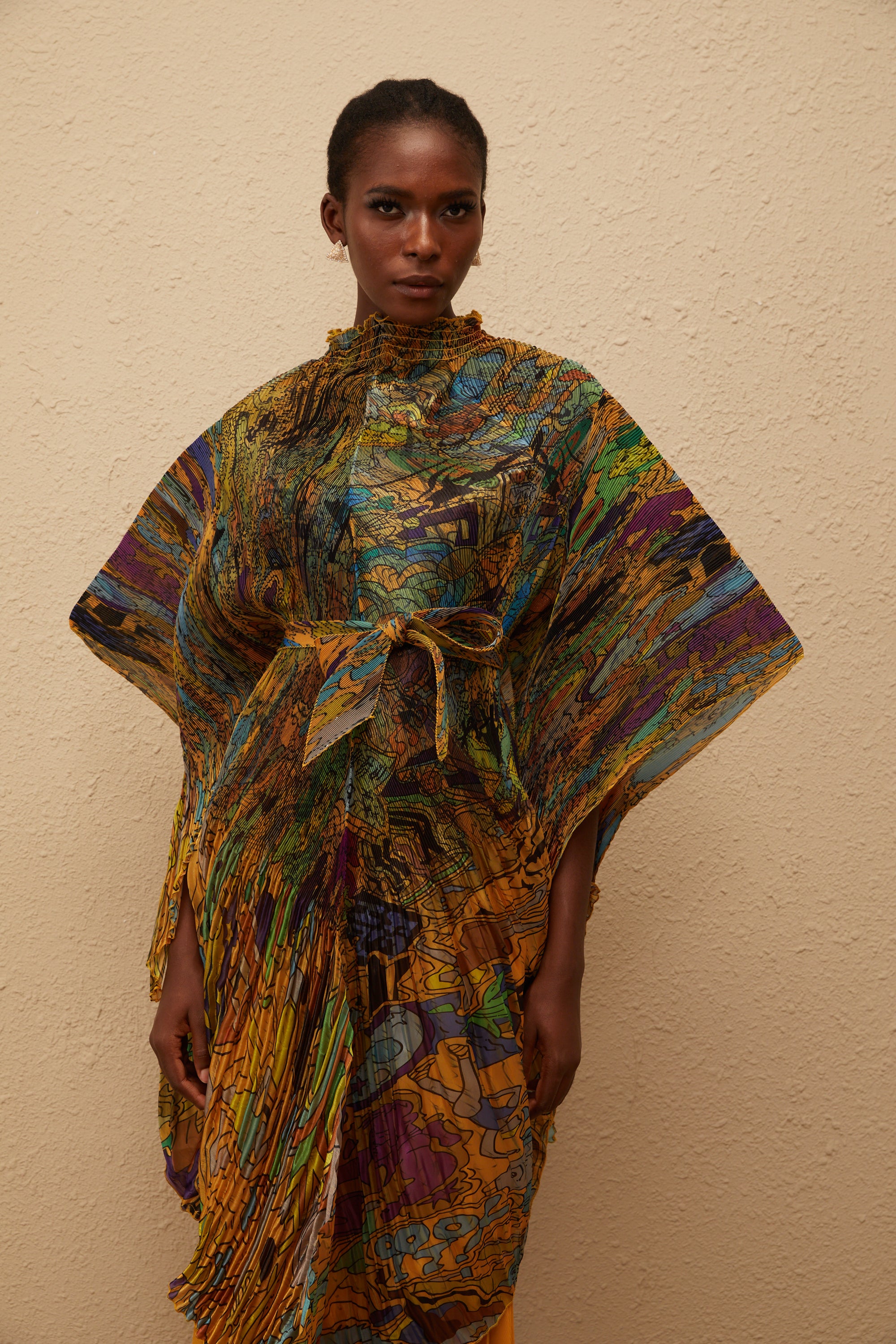 طقم بلوزة وبنطال مطوية بطبعة برتقالية من ميلودي