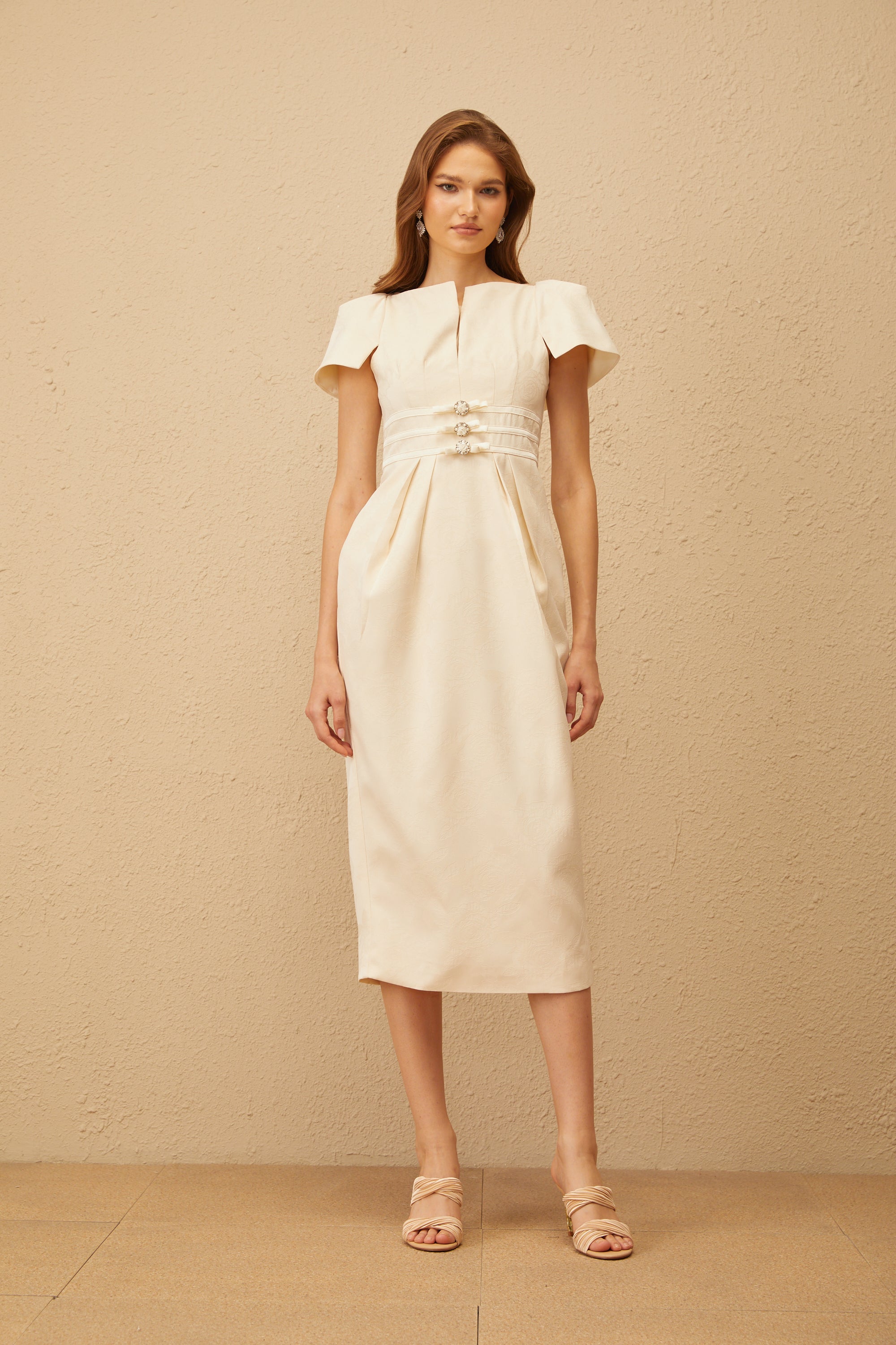 فستان أنطوانيت متوسط الطول بعقدة جاكار زهرية محايدة