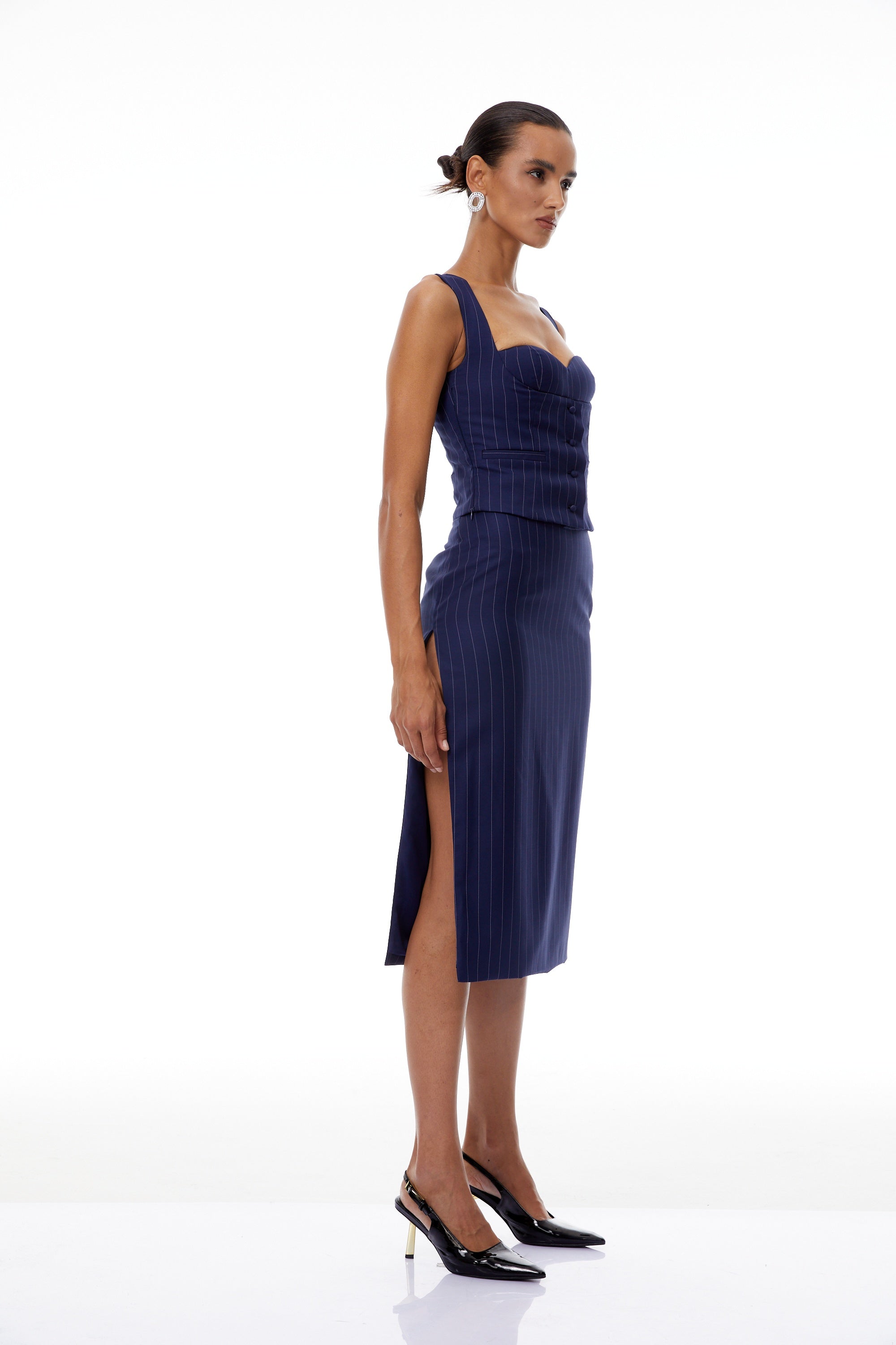 طقم أوريان بلوزة وتنورة مخططة باللون الأزرق الداكن