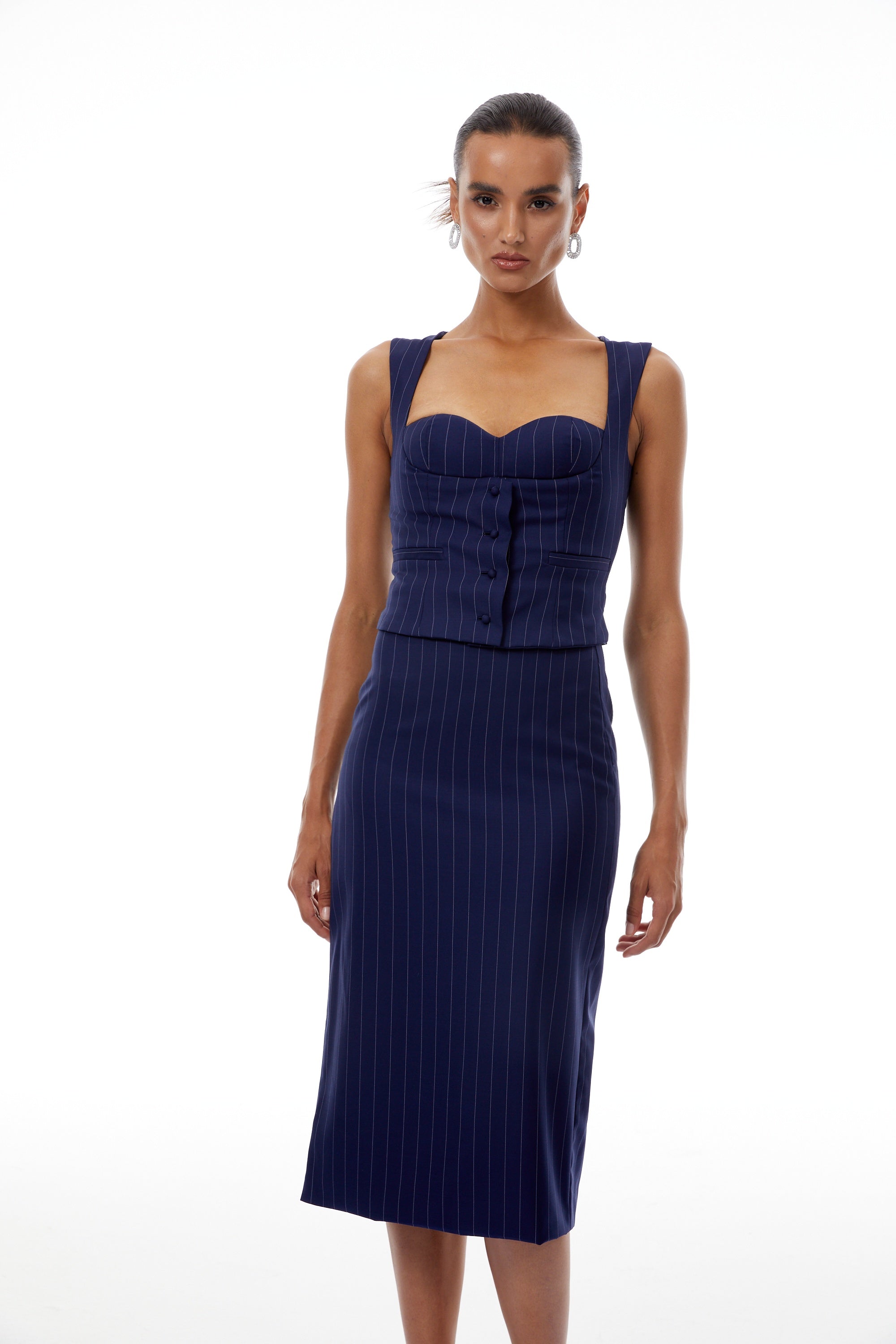 طقم أوريان بلوزة وتنورة مخططة باللون الأزرق الداكن