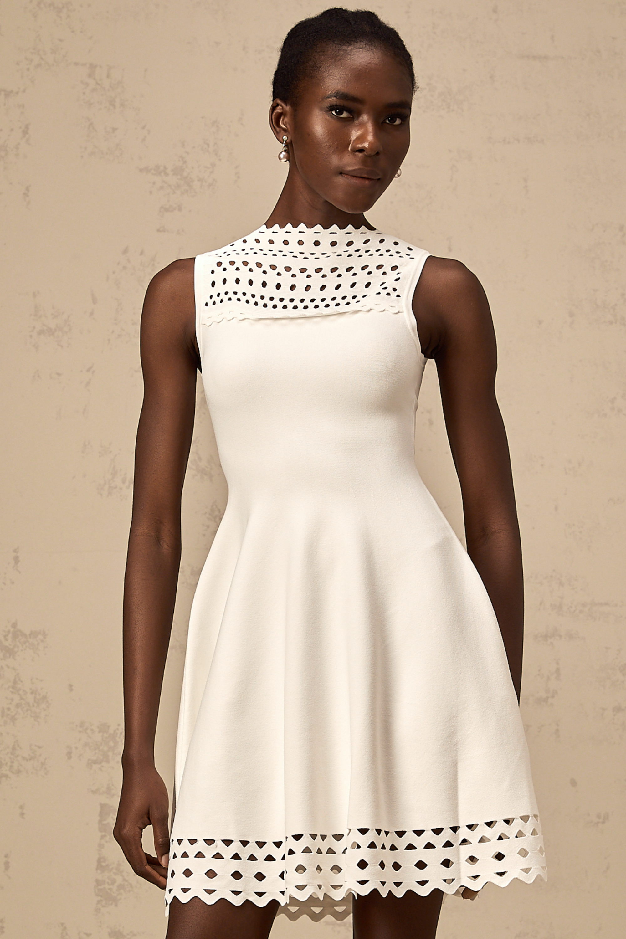 Colette white cut-out sleeveless knitted mini dress