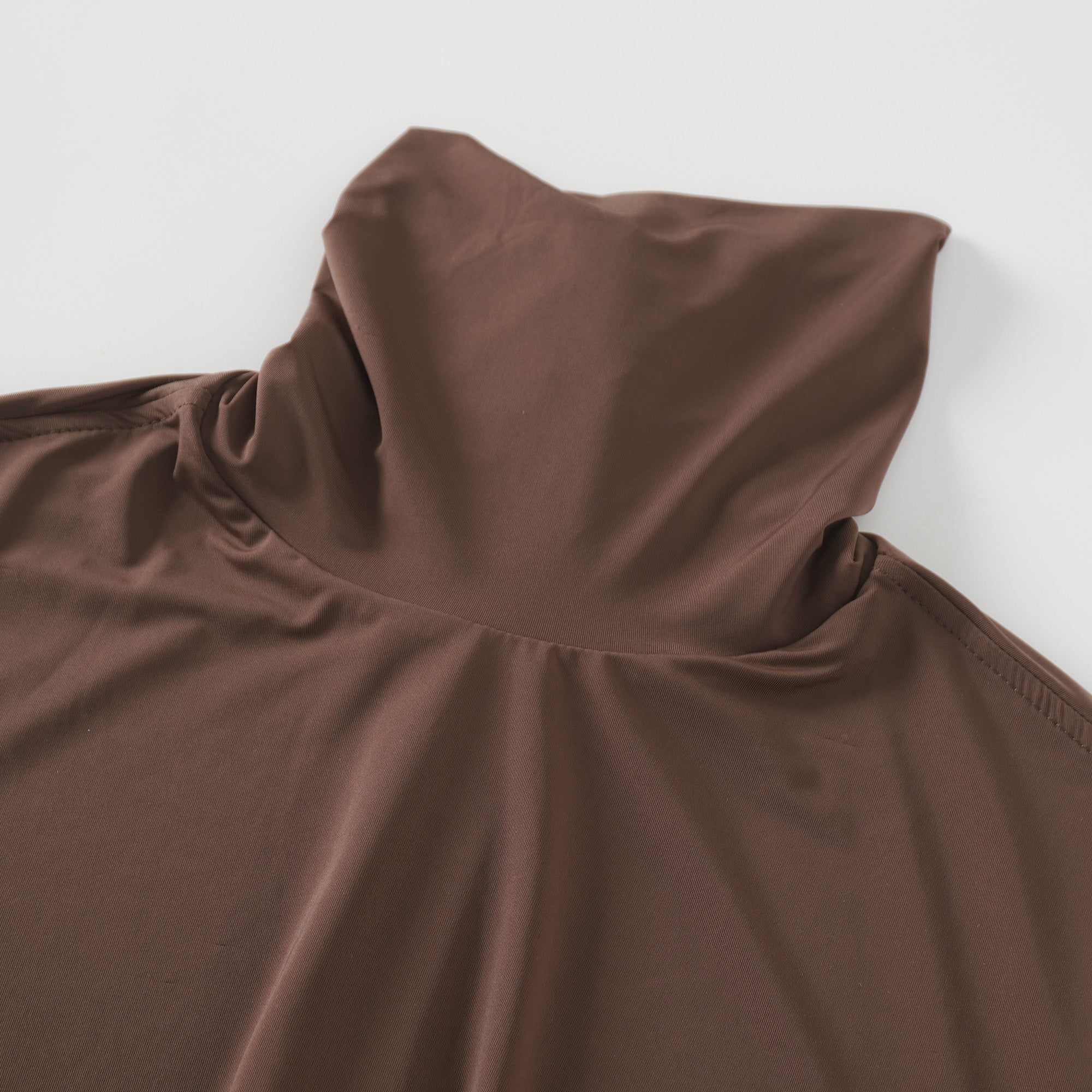 Brown turtleneck long-sleeved midi dress with a ruched skirt