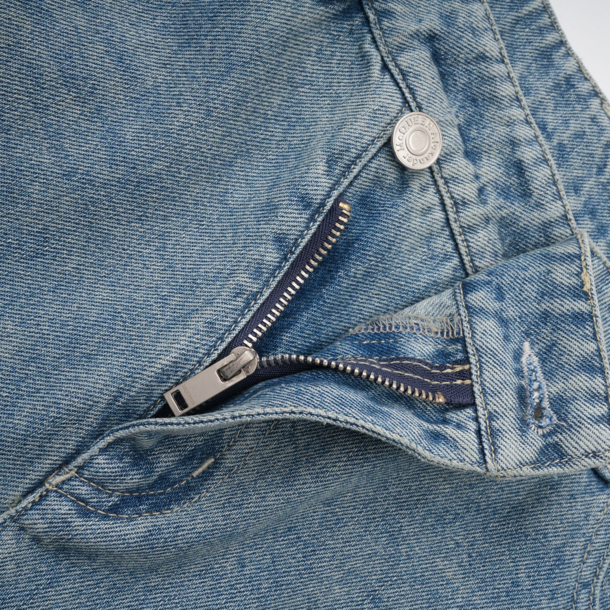 Géraldine strap-detail jeans