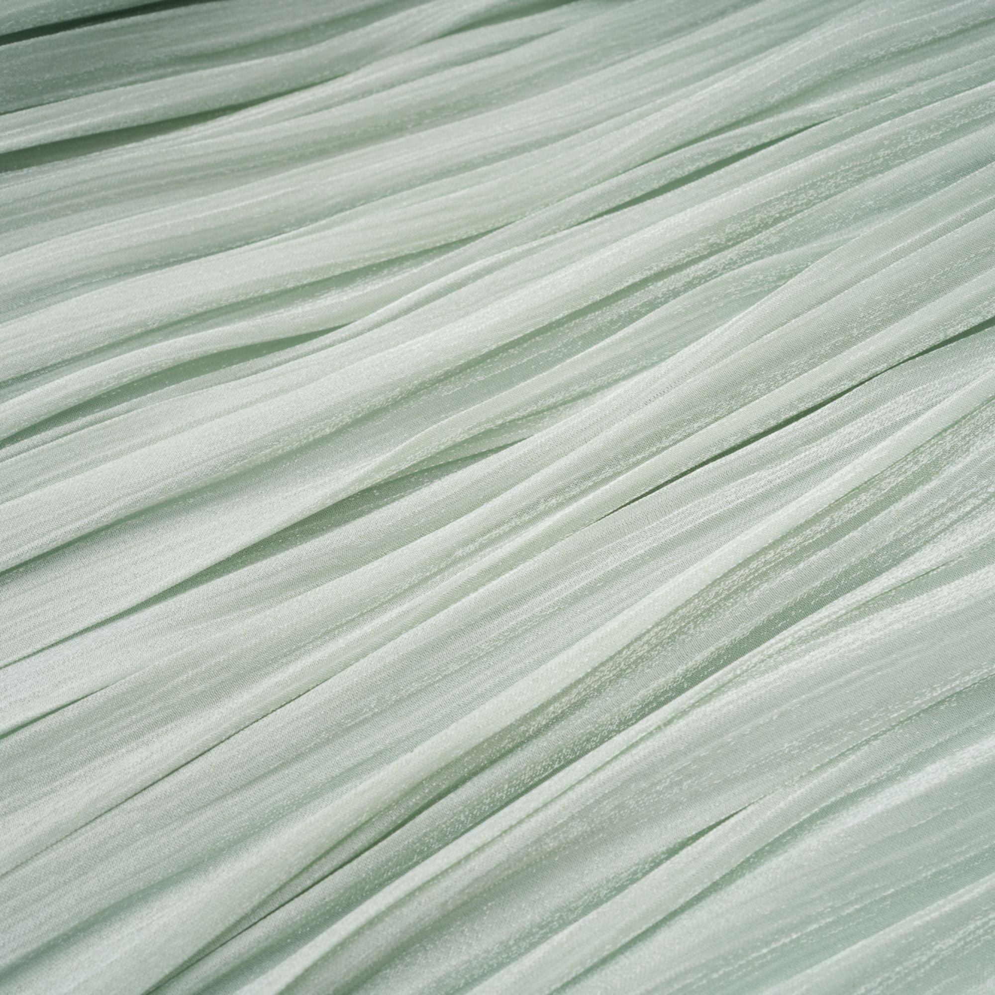 فستان ماكسي مكسّر باللون الأخضر النعناعي من يوراني