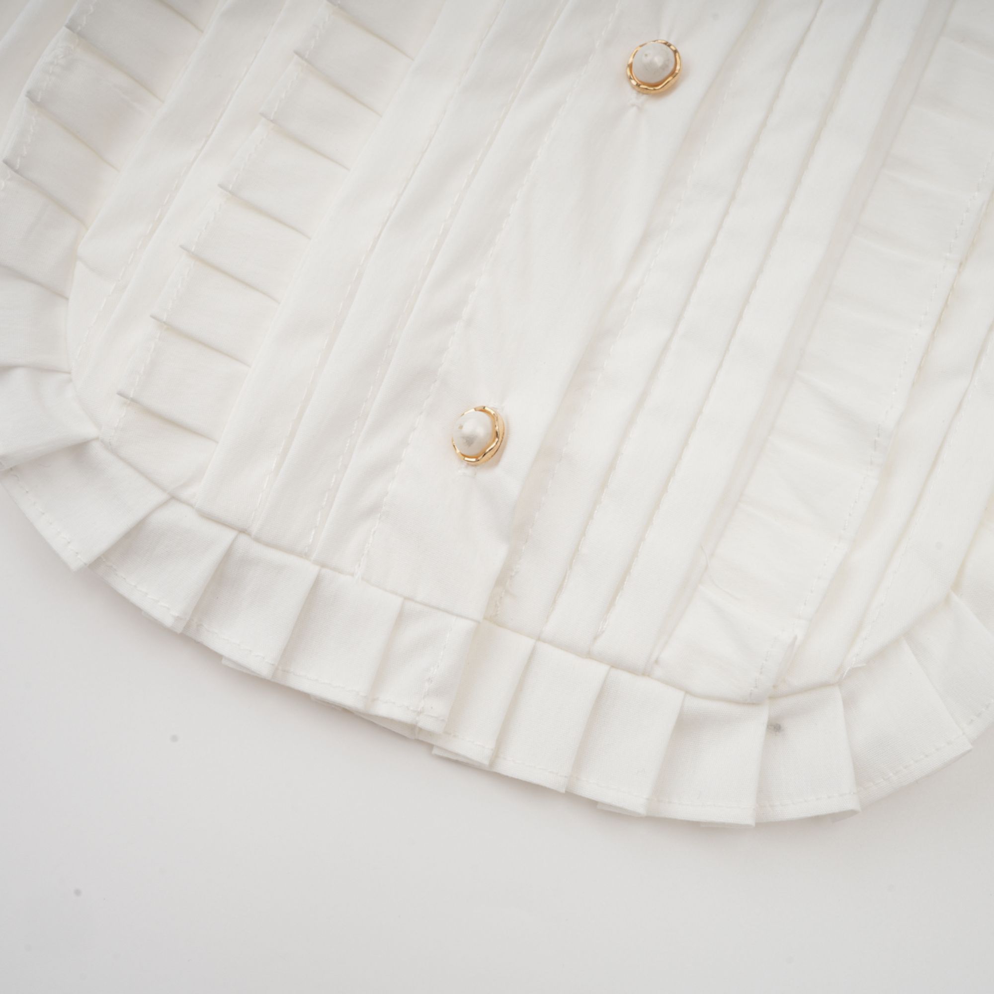 Céleste white pleated scarf-collar shirt