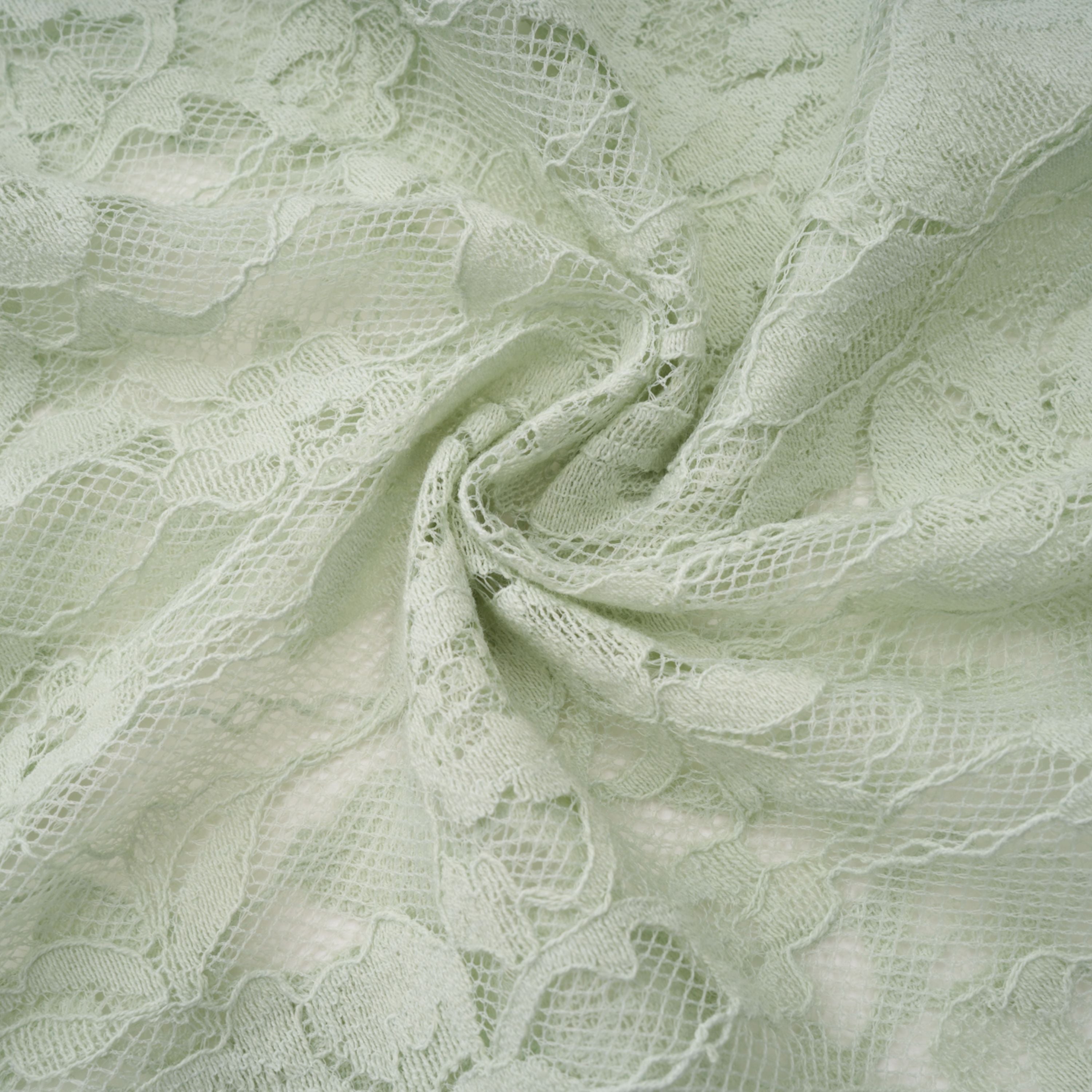 فستان قصير من الدانتيل الزهري شبه الشفاف بلون أخضر ساج من أليكسيس