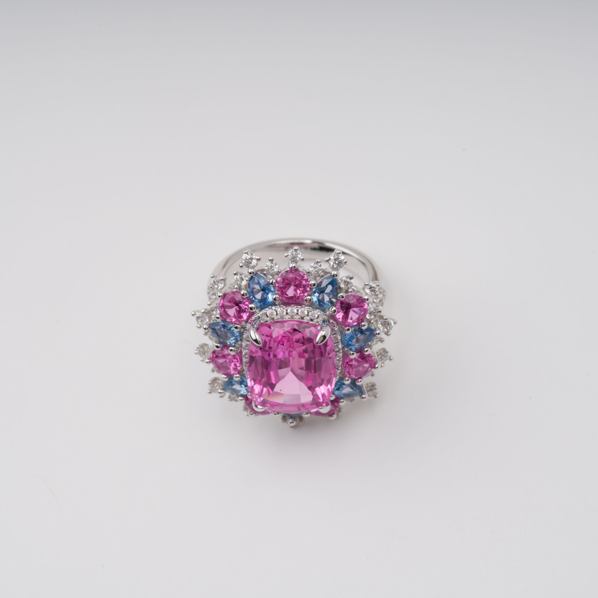 Révérence Sterling-Silberring mit rosa Zirkonia-Edelsteinen im Halo-Set