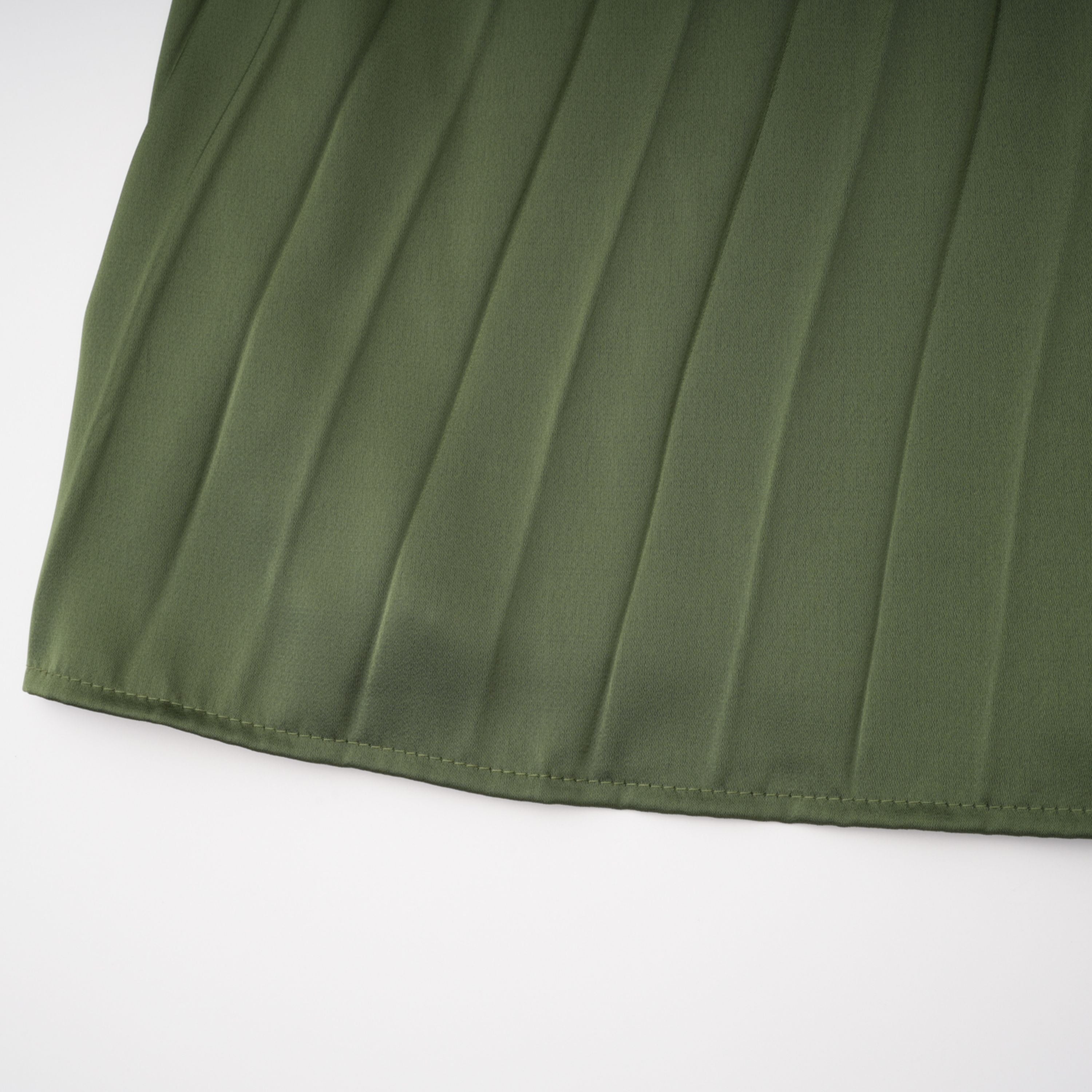 Robe longue plissée asymétrique vert émeraude Firoozeh