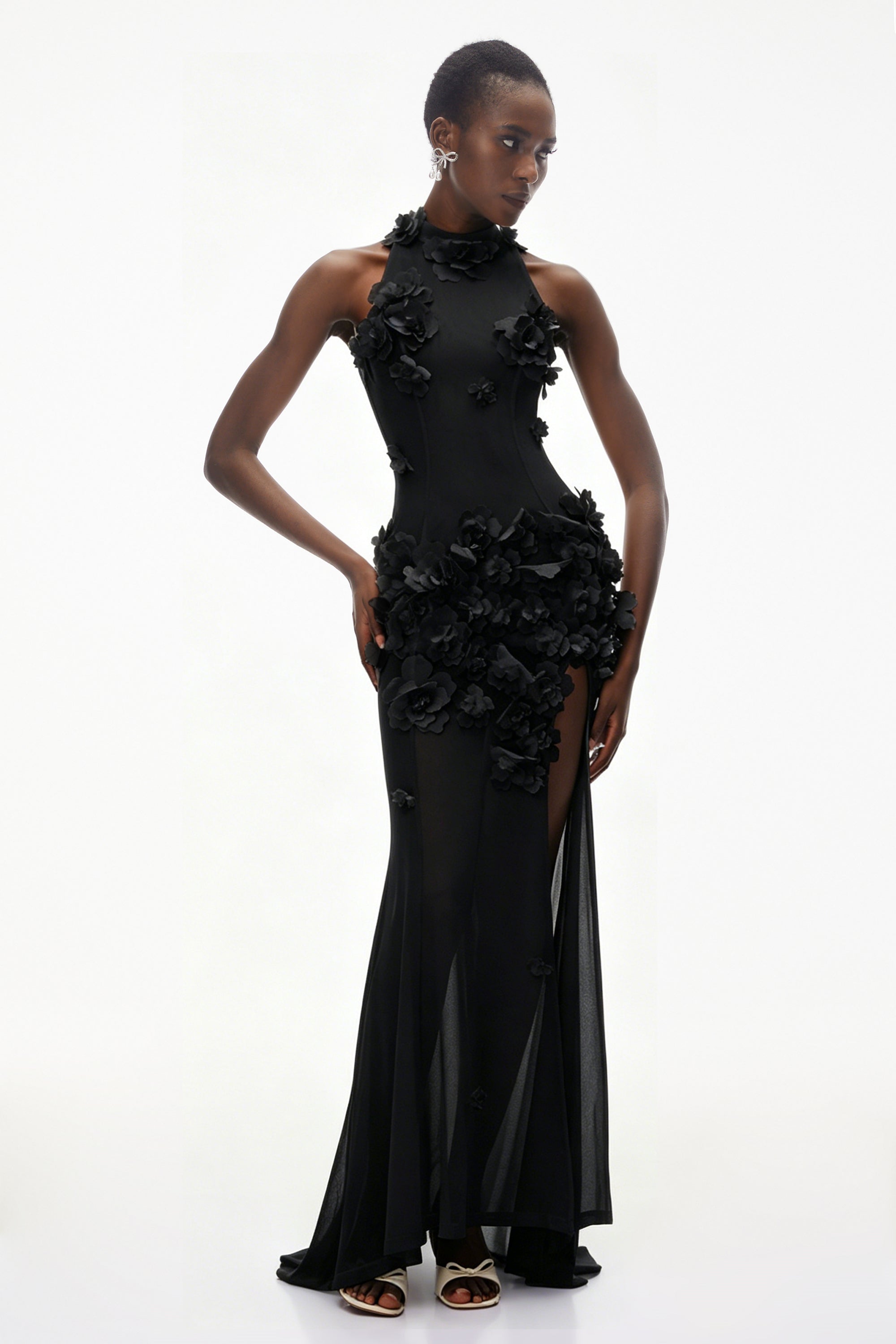Black halter-neck maxi gown with 3D floral appliqué