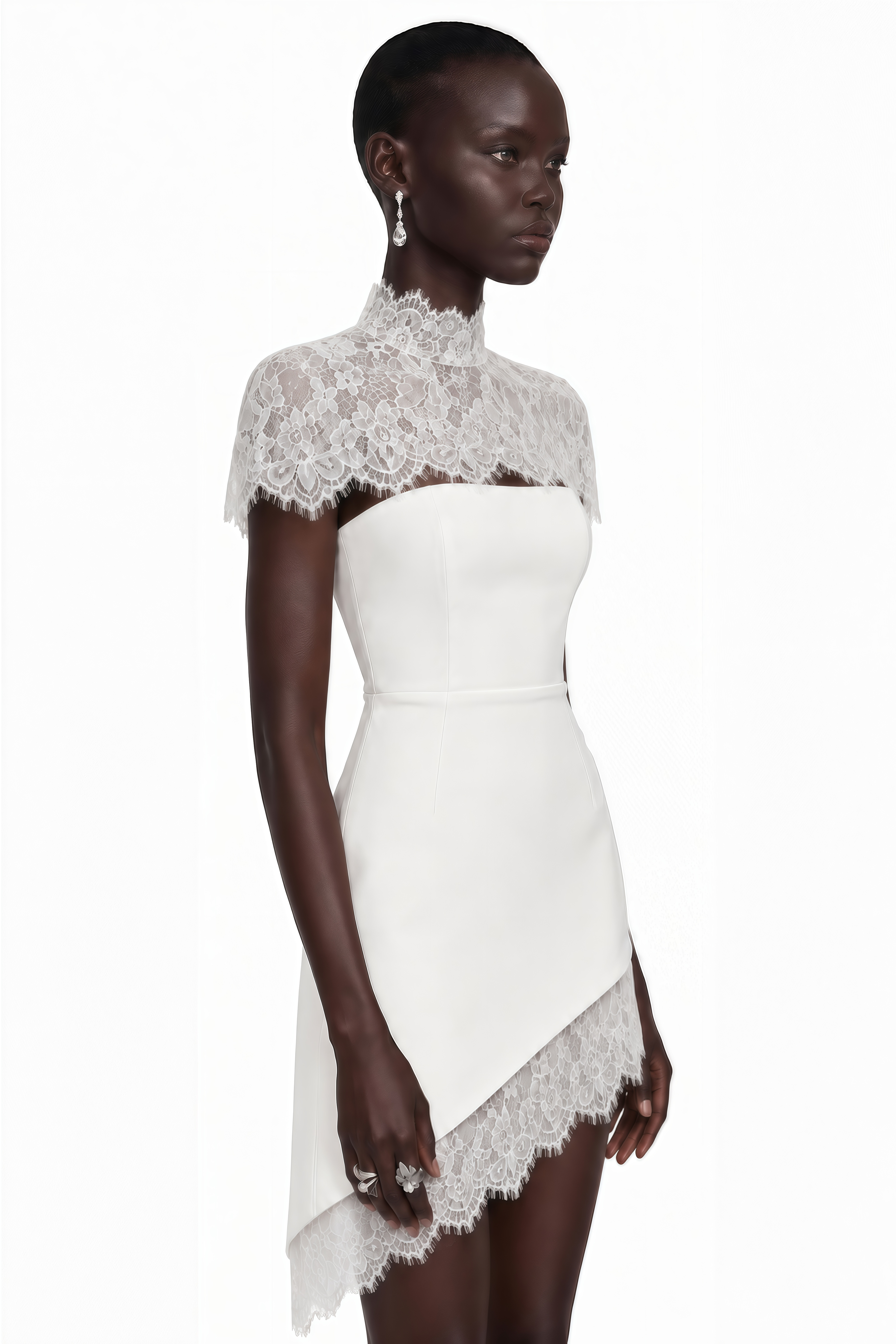 White strapless mini dress with a high-neck lace capelet and asymmetrical hem