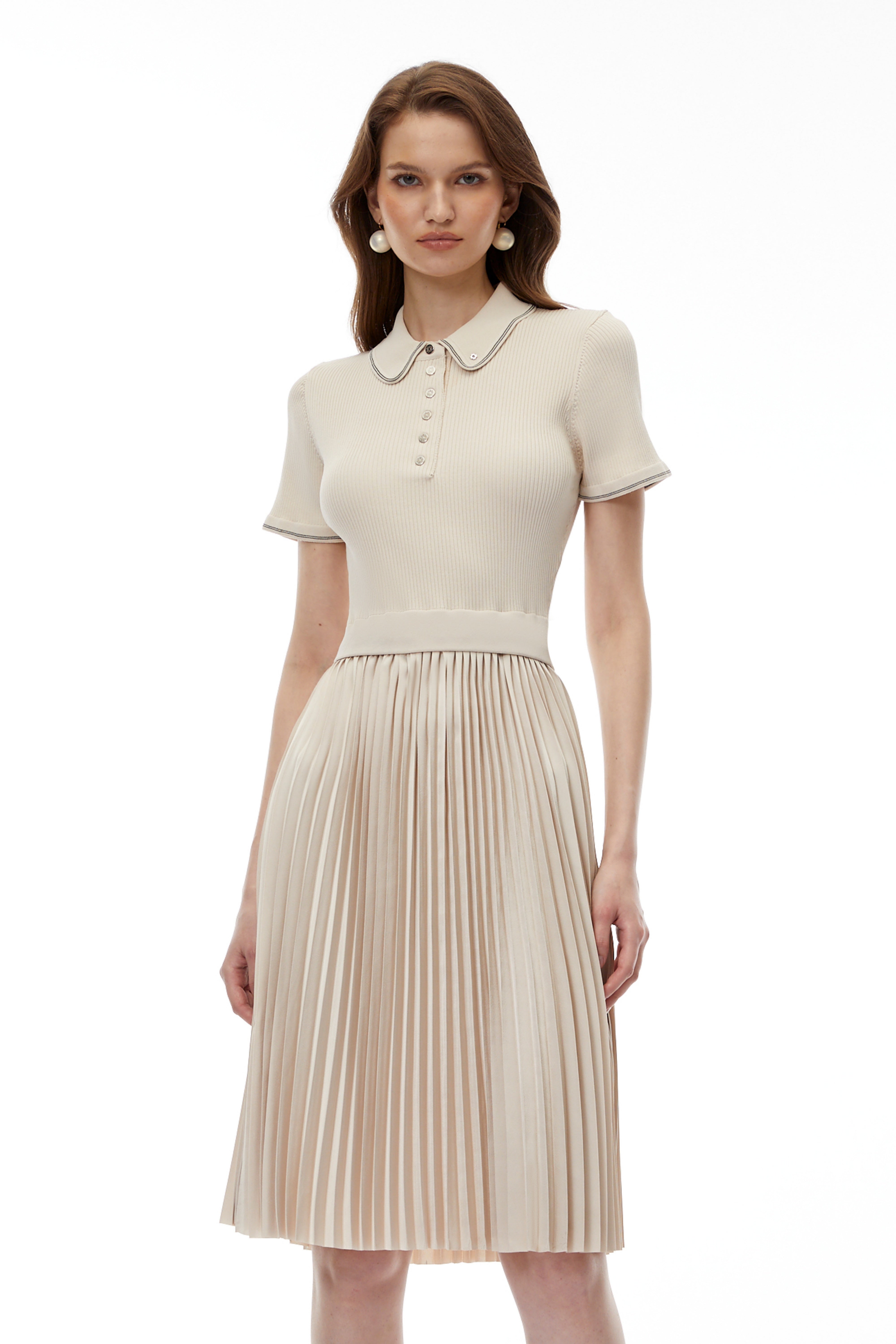 فستان كاليپسو ميدي بلون كريمي من نسيج مطاطي