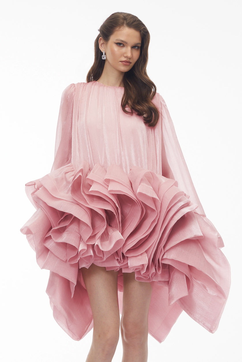 Pink organza high-low mini dress featuring a pleated bodice and a dramatic multi-layered ruffled skirt