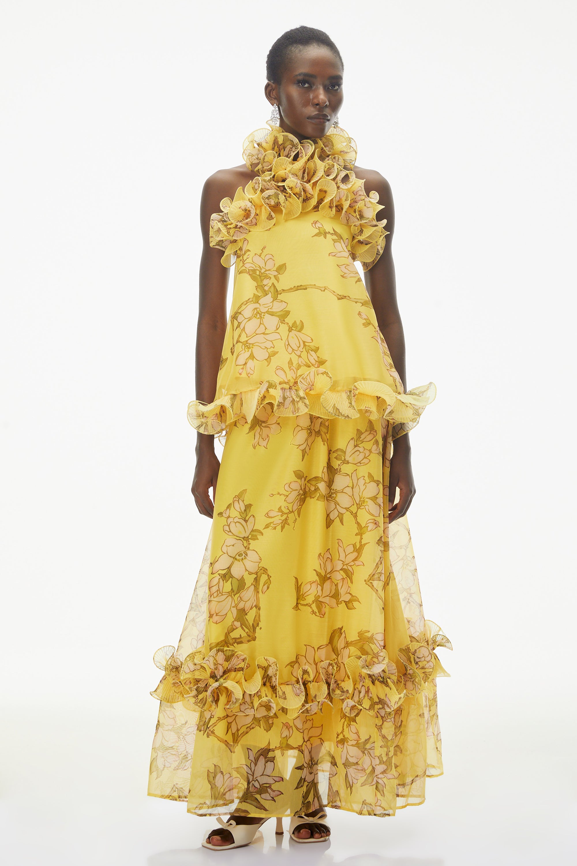 Tamanna – Set aus gelbem Oberteil mit Blumenmuster und Rüschen sowie Rock