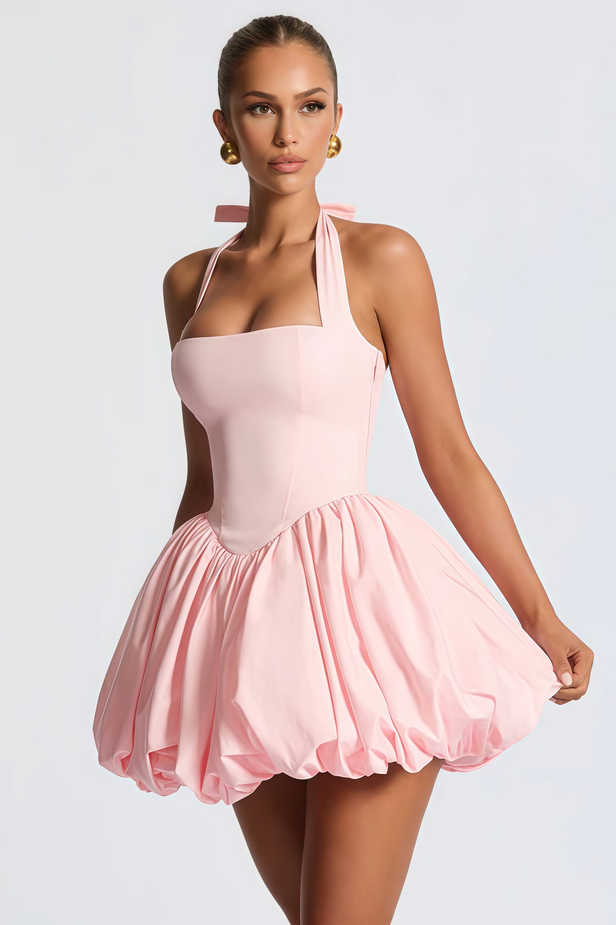 فستان أنيل الصغير ذو الأكمام المنتفخة باللون الوردي.