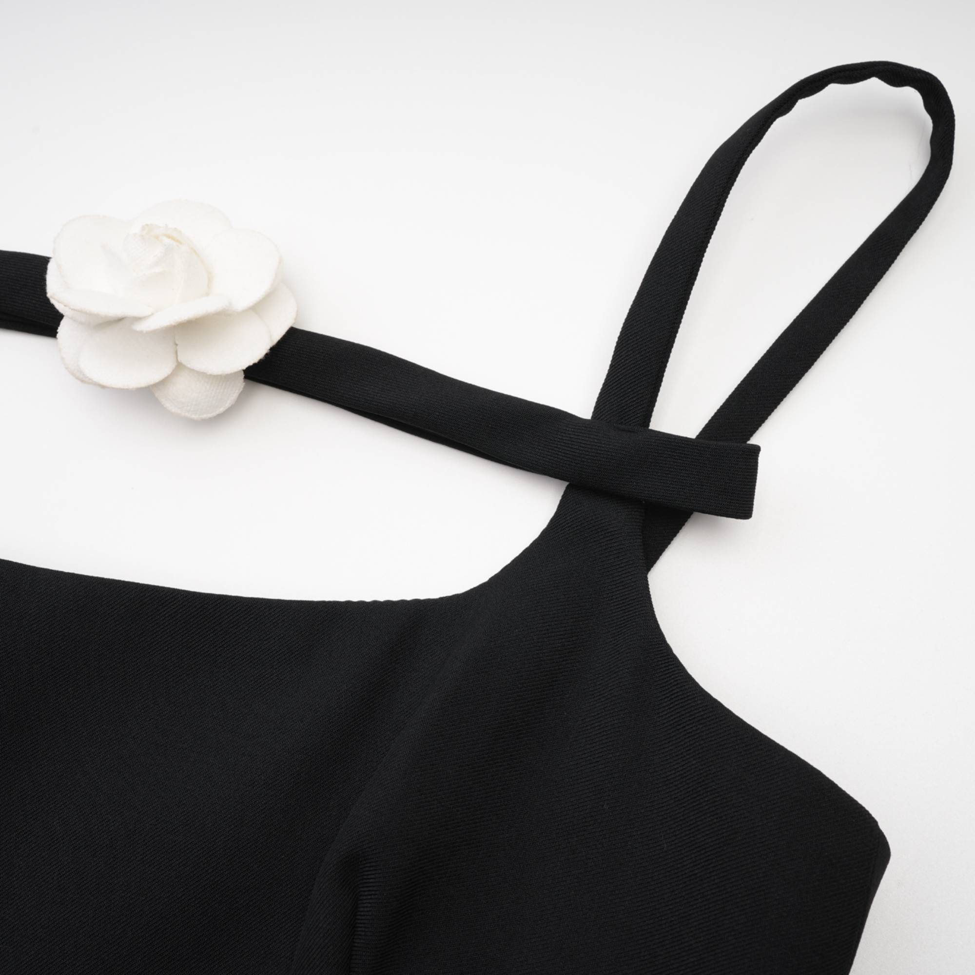 Camellia pleated black mini dress